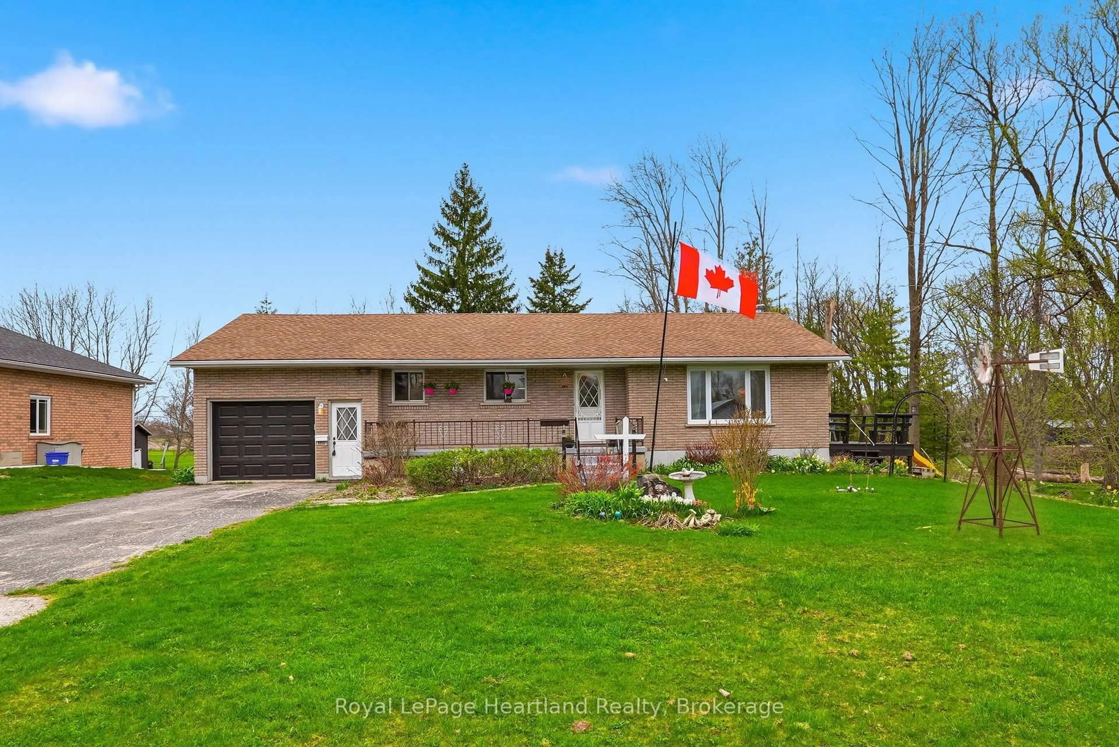 A pic from outside/outdoor area/front of a property/back of a property/a pic from drone, street for 21 Brown St, Minto Ontario N0G 1M0