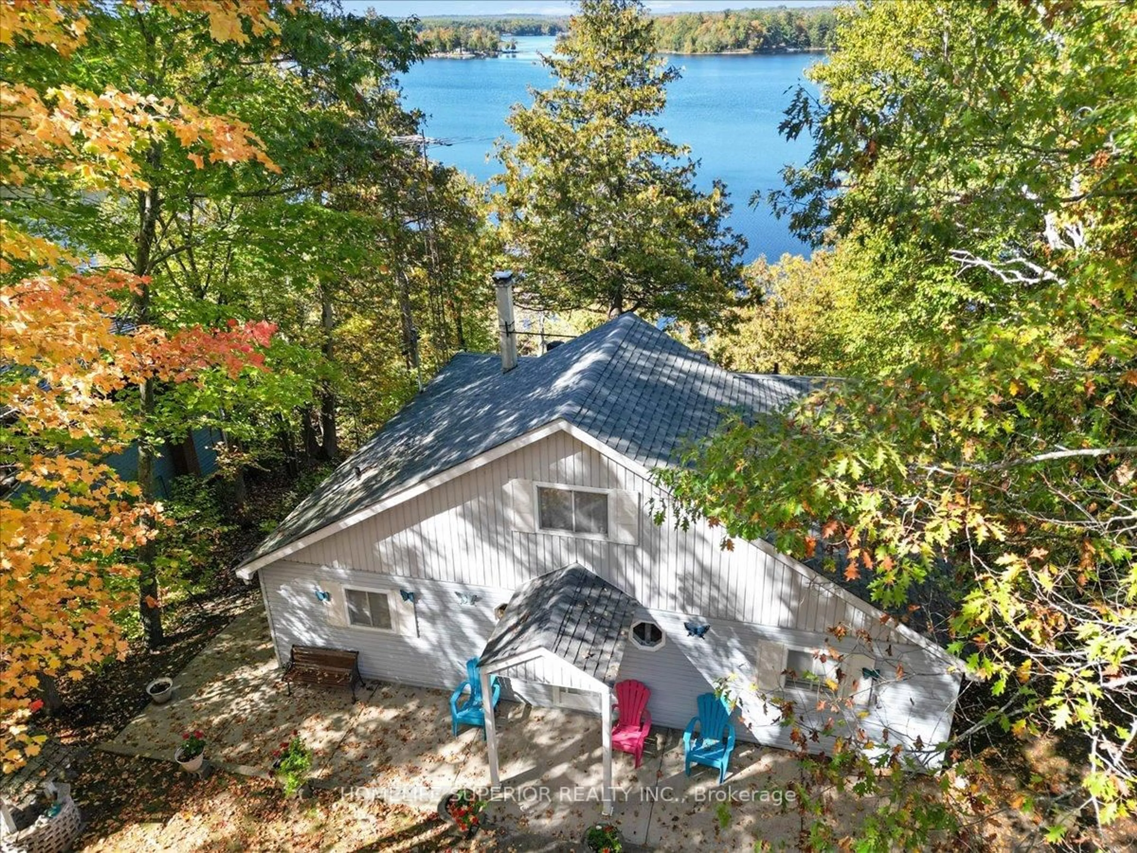 A pic from outside/outdoor area/front of a property/back of a property/a pic from drone, water/lake/river/ocean view for 105 High Shore Rd, Limoges Ontario K0K 2M0