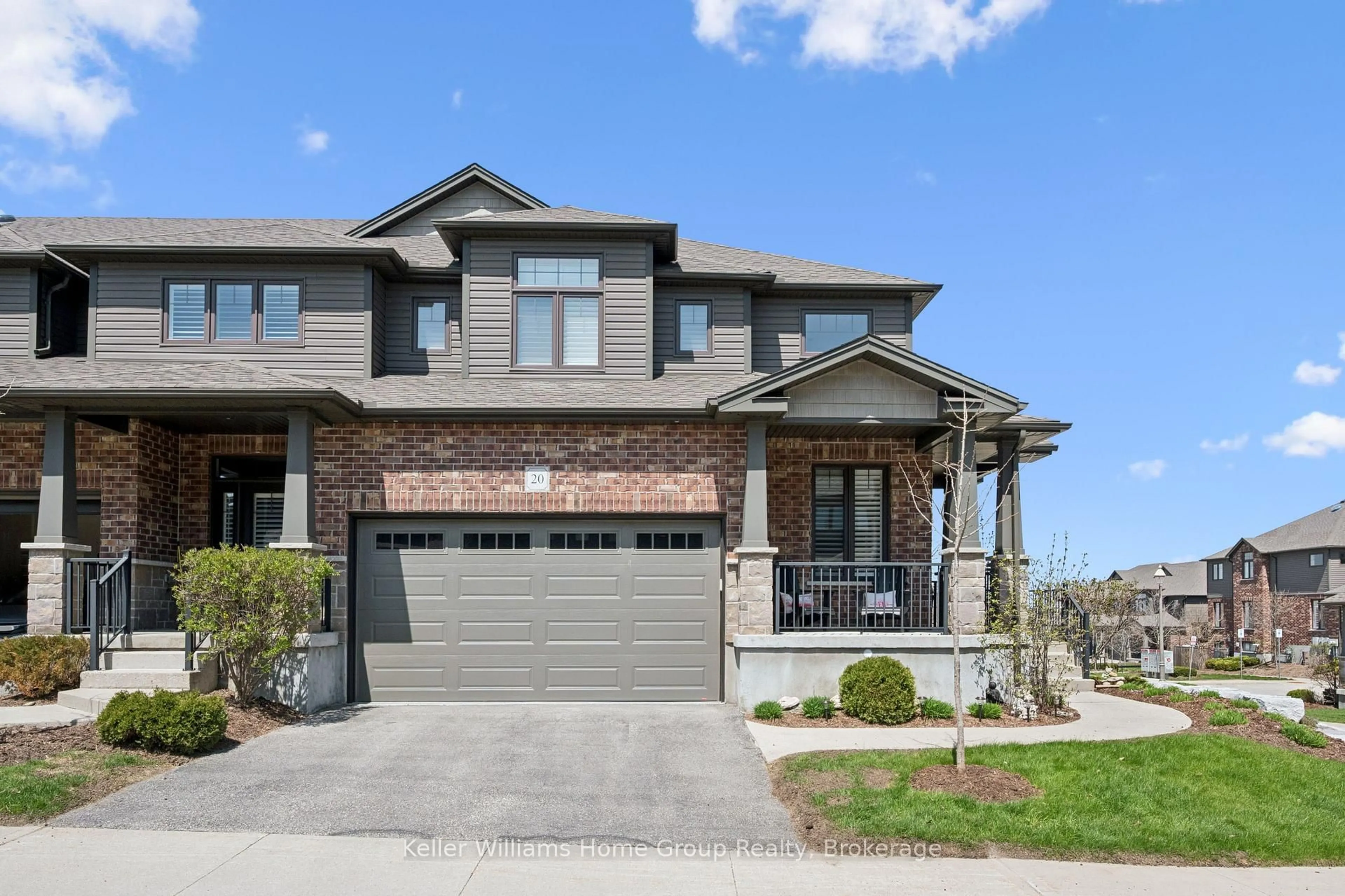 Home with brick exterior material, street for 254 Gosling Gardens #20, Guelph Ontario N1L 1G7