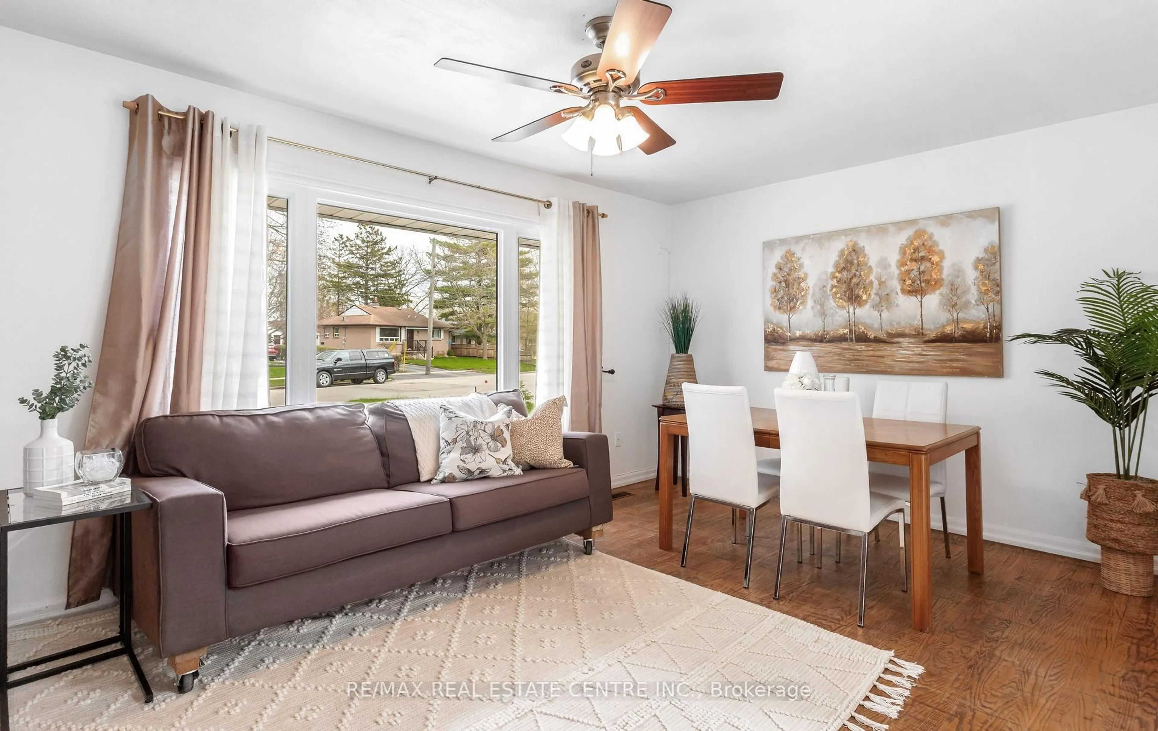 Living room with furniture, wood/laminate floor for 50 Dumbarton St, Guelph Ontario N1E 3T6