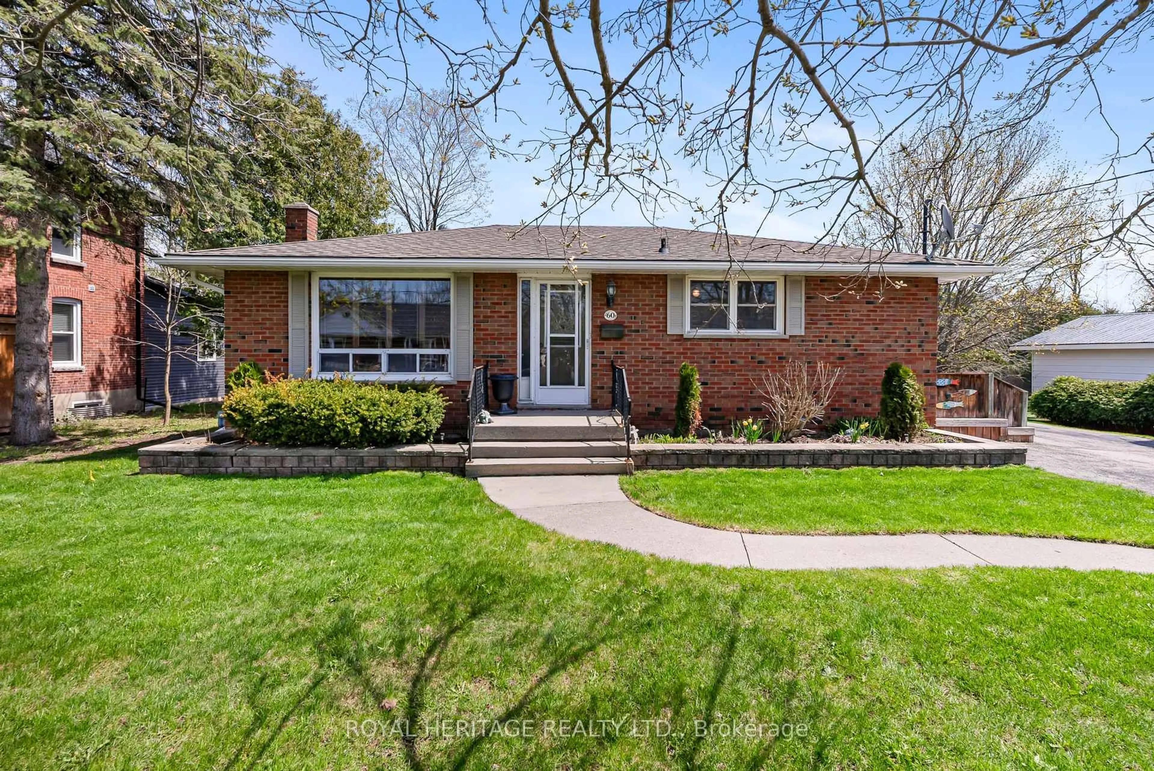 Home with brick exterior material, street for 60 St. Patrick St, Kawartha Lakes Ontario K9V 1R5