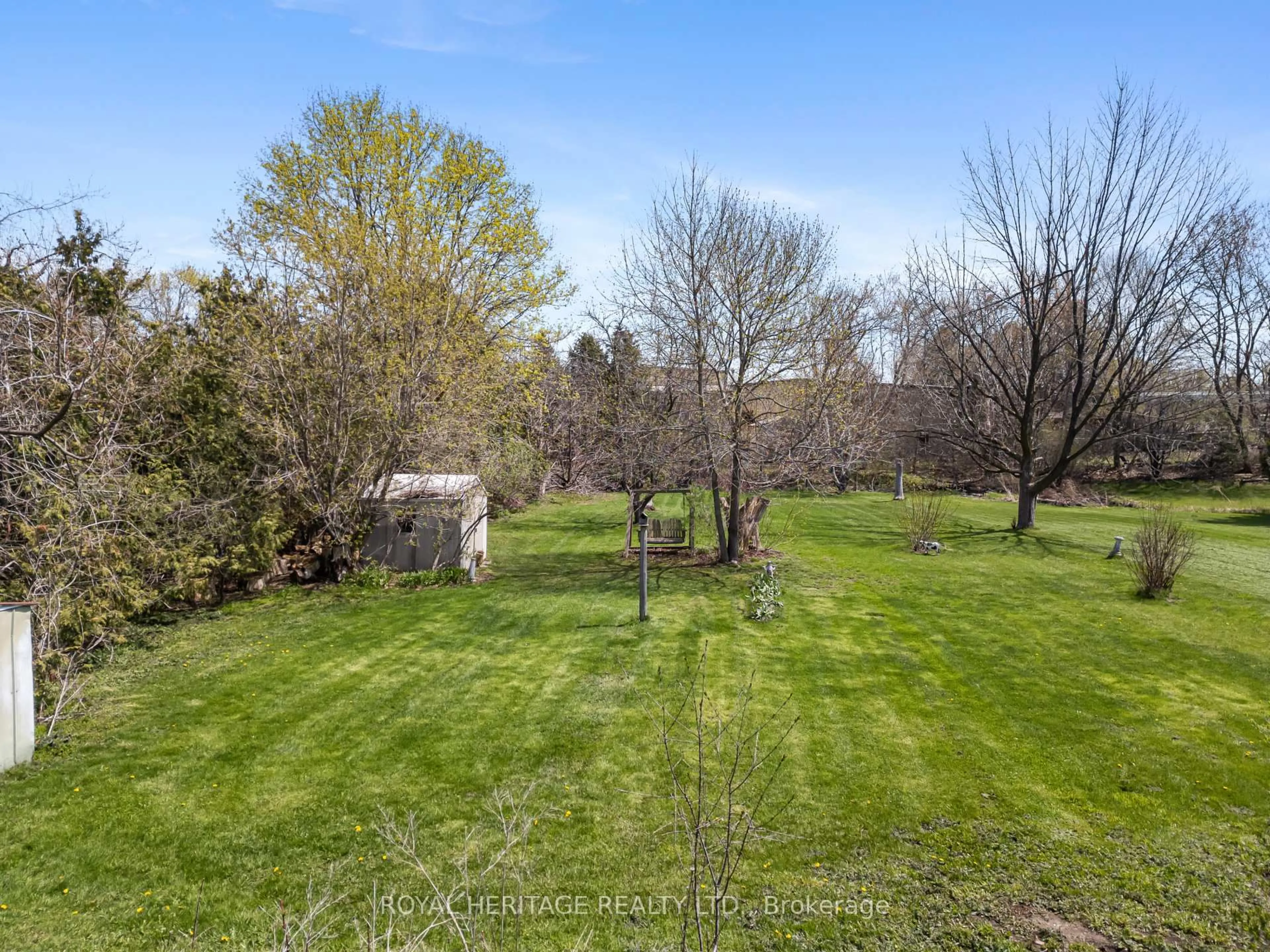 A pic from outside/outdoor area/front of a property/back of a property/a pic from drone, forest/trees view for 60 St. Patrick St, Kawartha Lakes Ontario K9V 1R5