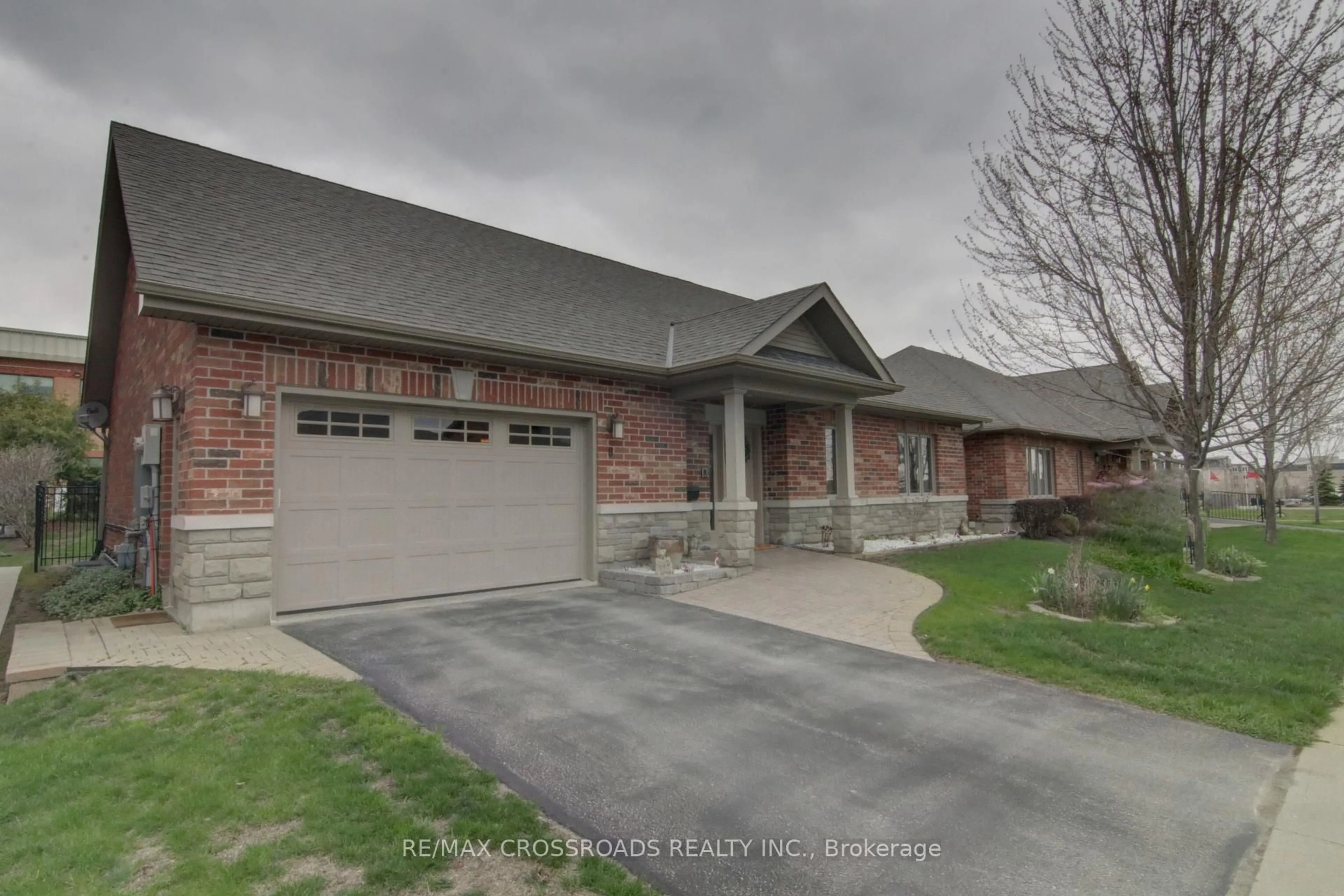 Home with brick exterior material, street for 8 Green Arbour Way, Kawartha Lakes Ontario K9V 0E6