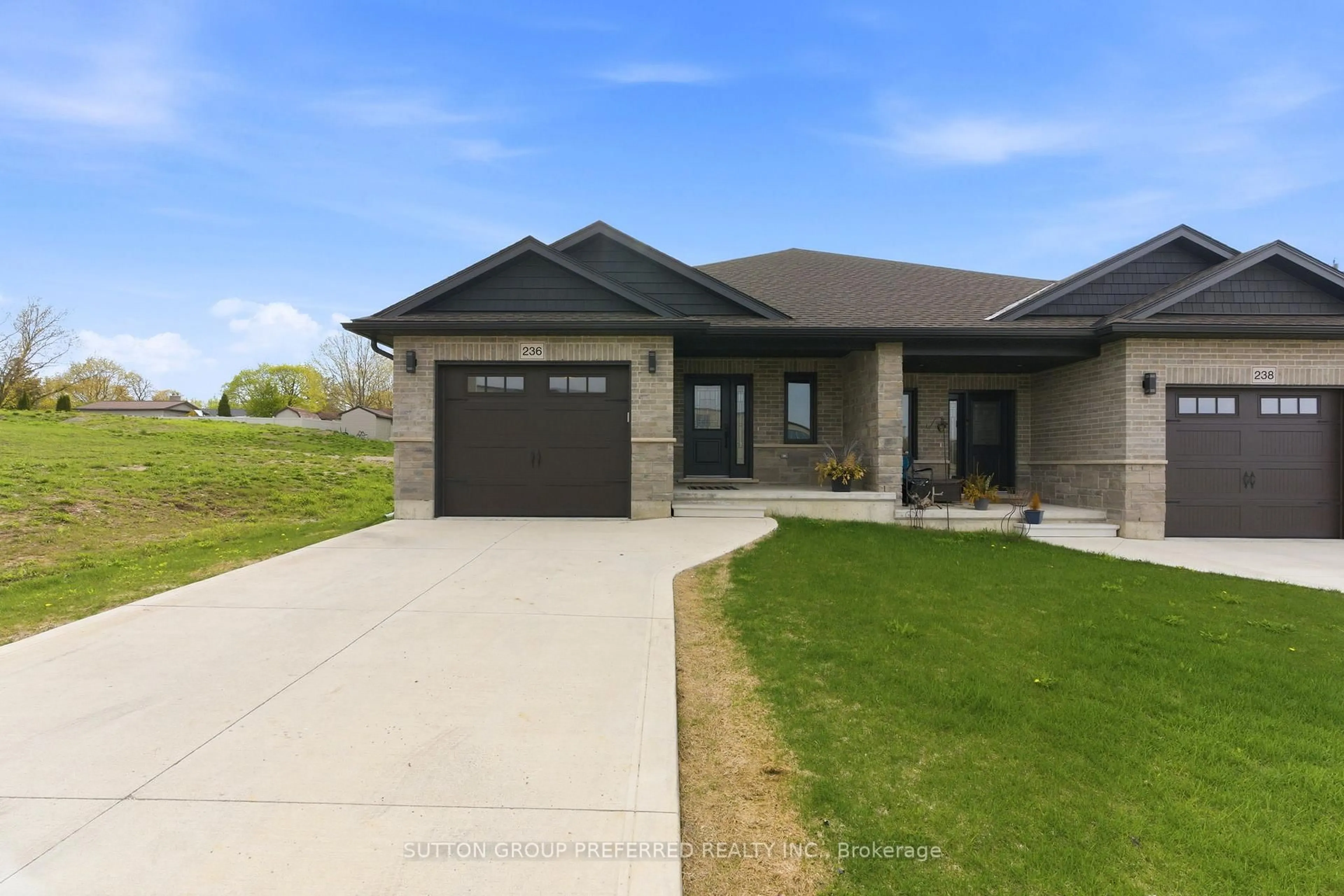 Home with brick exterior material, street for 236 BEECH St, Central Huron Ontario N0M 1L0