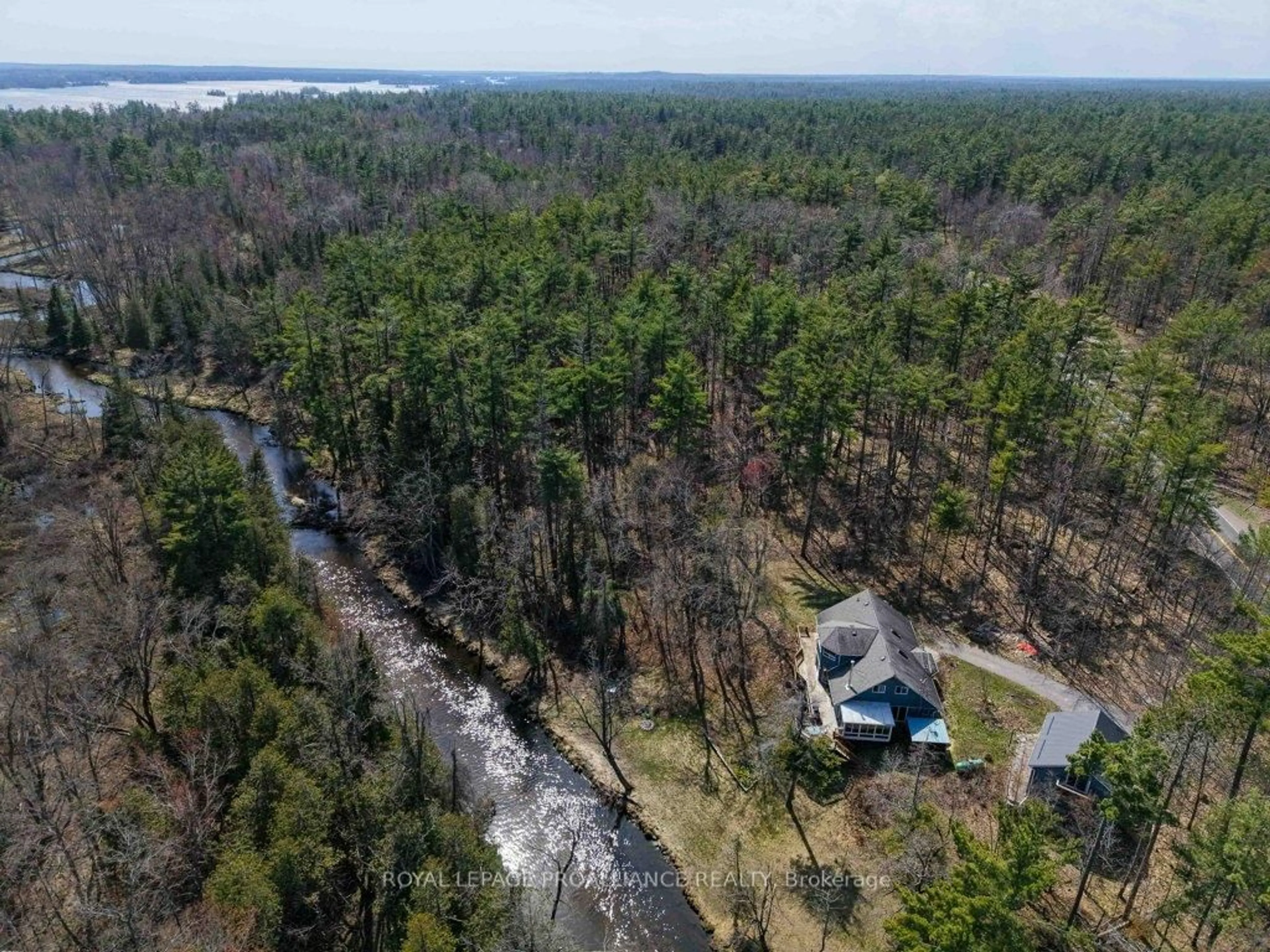 A pic from outside/outdoor area/front of a property/back of a property/a pic from drone, water/lake/river/ocean view for 2406 Northeys Bay Rd, North Kawartha Ontario K0L 2H0
