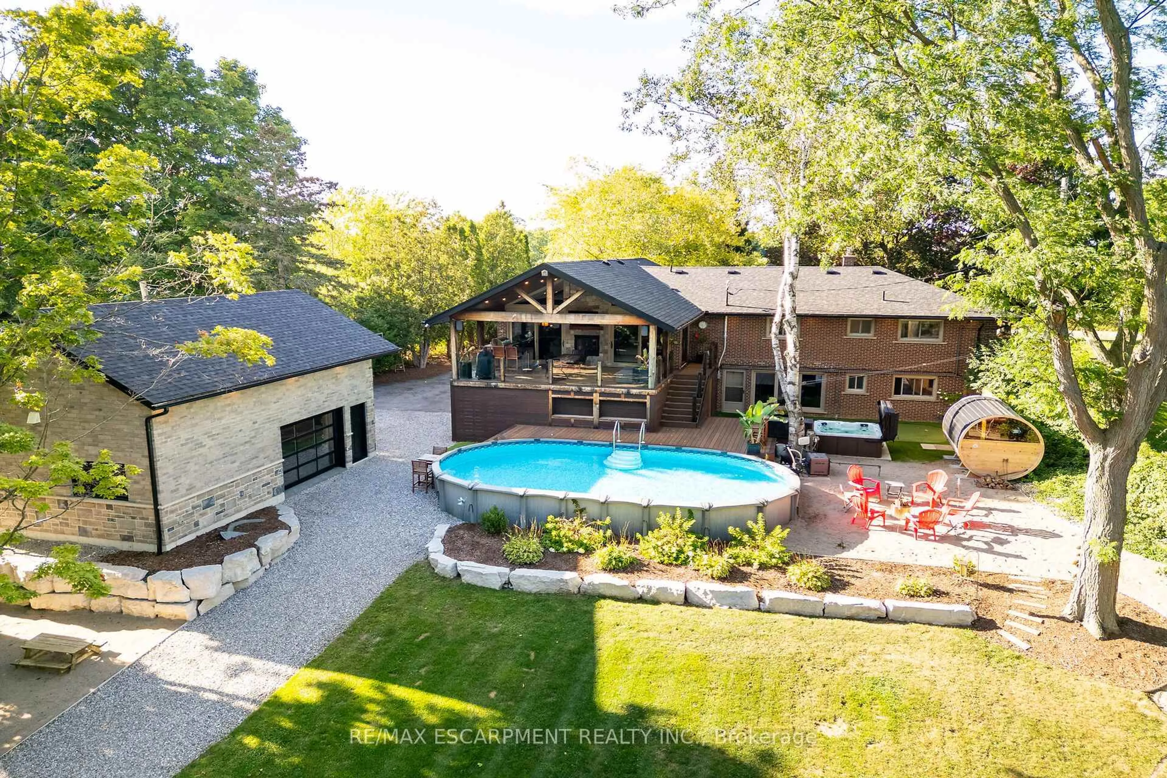 A pic from outside/outdoor area/front of a property/back of a property/a pic from drone, water/lake/river/ocean view for 1417 Highway 54, Haldimand Ontario N3W 2G9