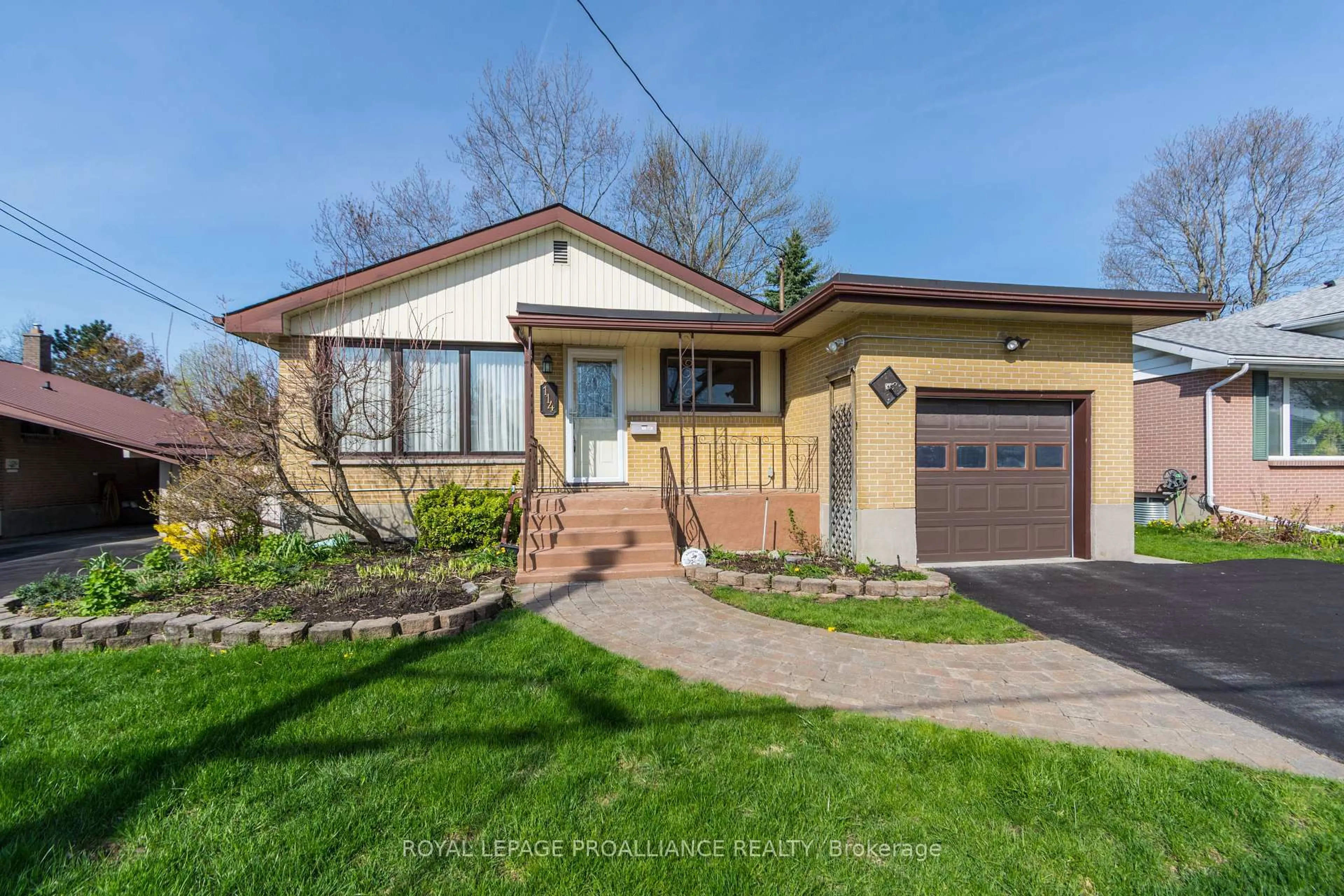 Home with brick exterior material, street for 114 Rollins Dr, Belleville Ontario K8N 4J5