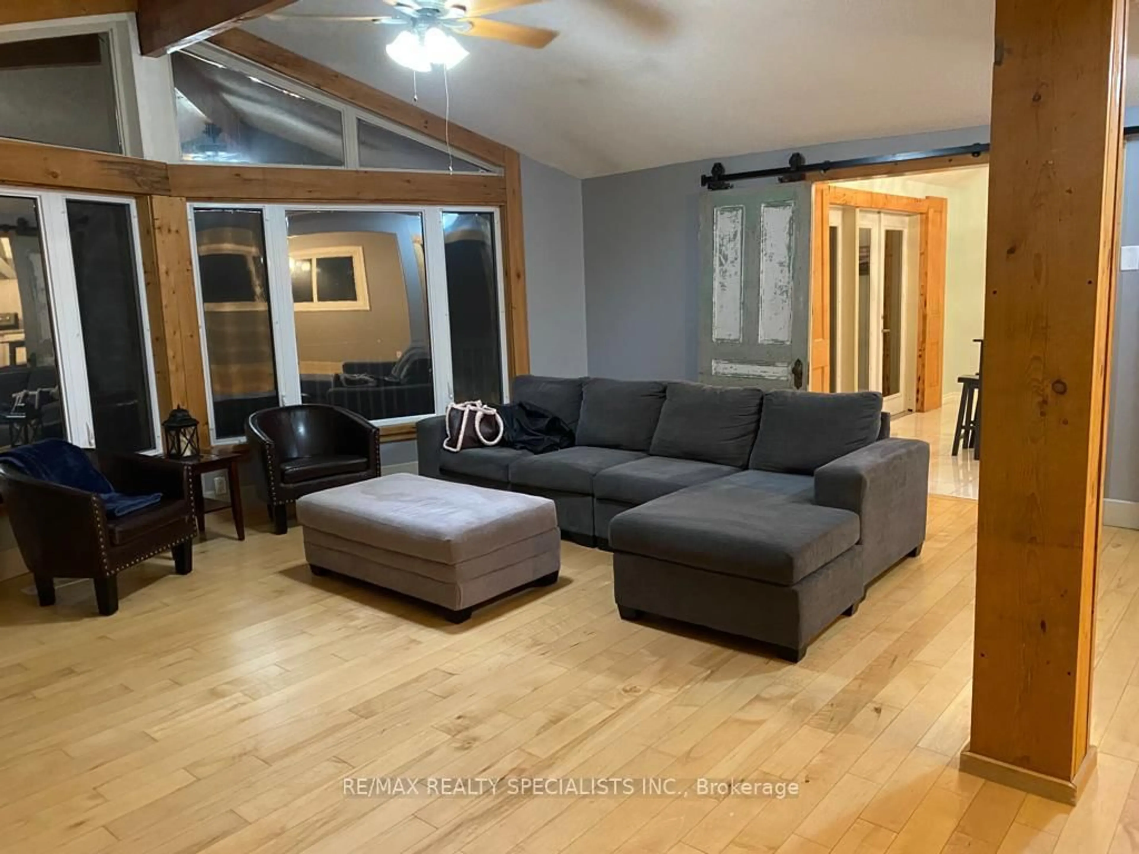 Living room with furniture, wood/laminate floor for 236 Rutherford Rd, Alnwick/Haldimand Ontario K0K 1S0