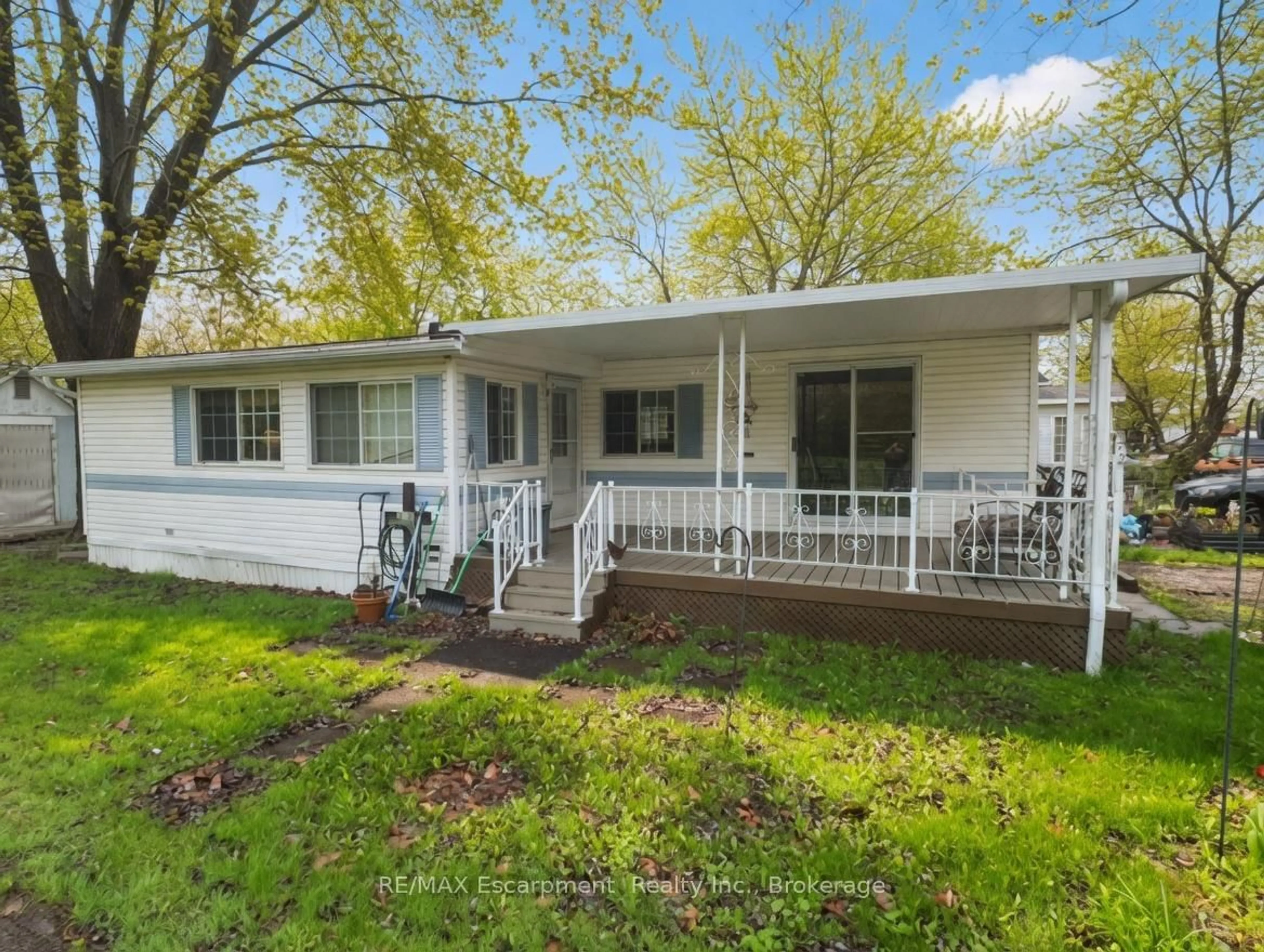 Home with vinyl exterior material, street for 8845 Lundy's Lane #232, Niagara Falls Ontario L2H 1H5