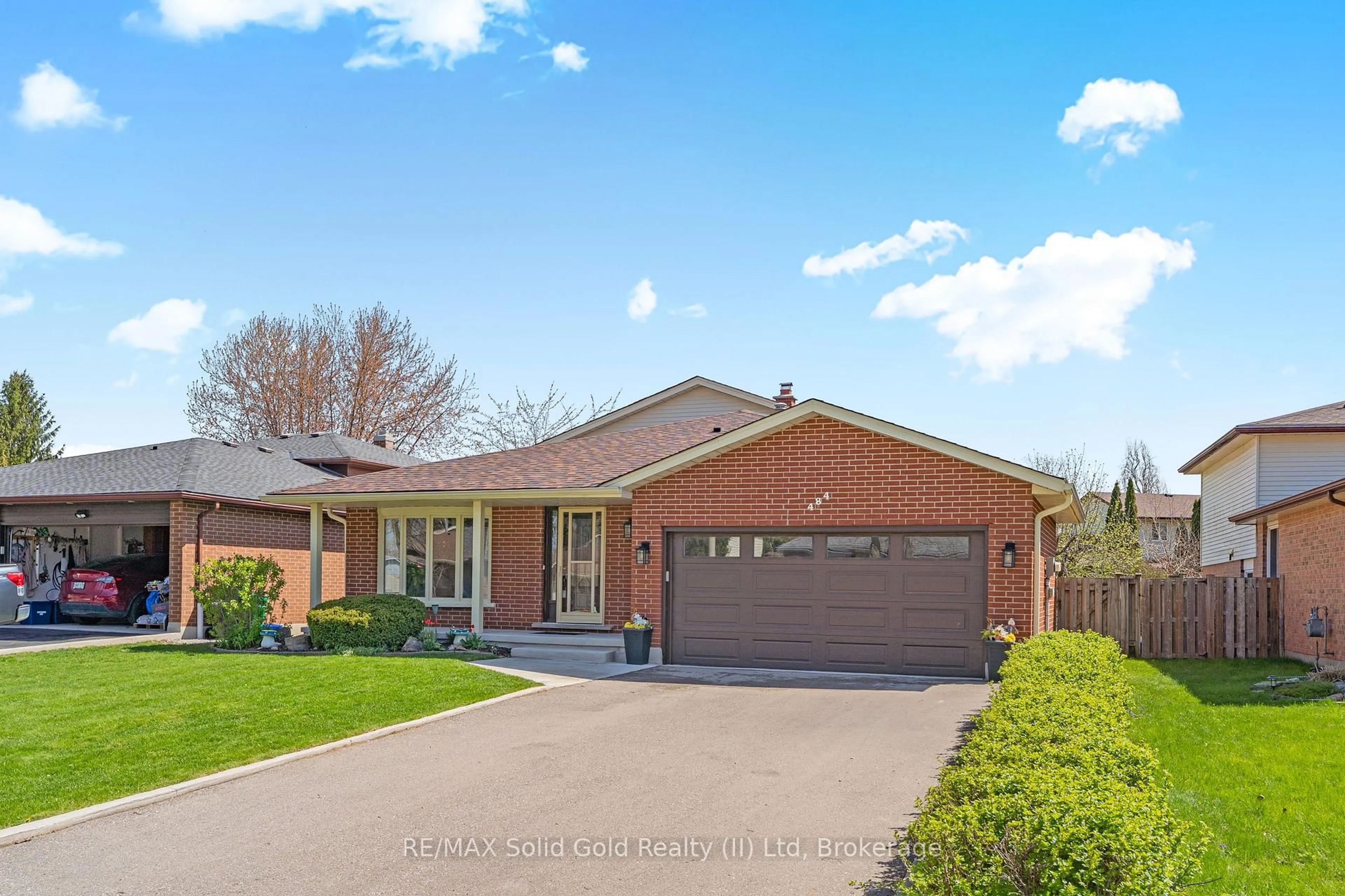 Home with brick exterior material, street for 484 Hunterswood Crt, Waterloo Ontario N2K 3E9