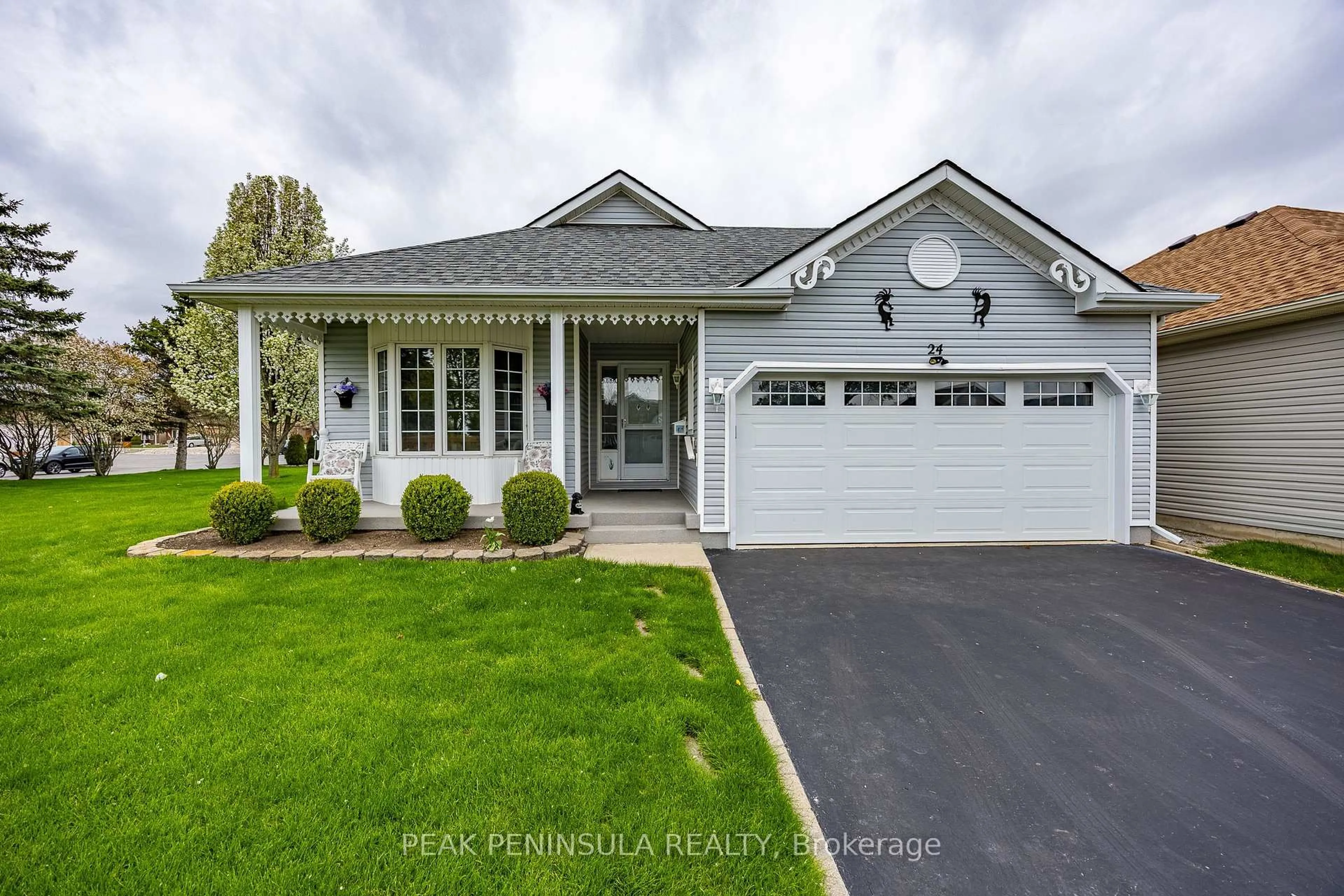 Home with vinyl exterior material, street for 24 Long Point Blvd, Norfolk Ontario N0E 1M0