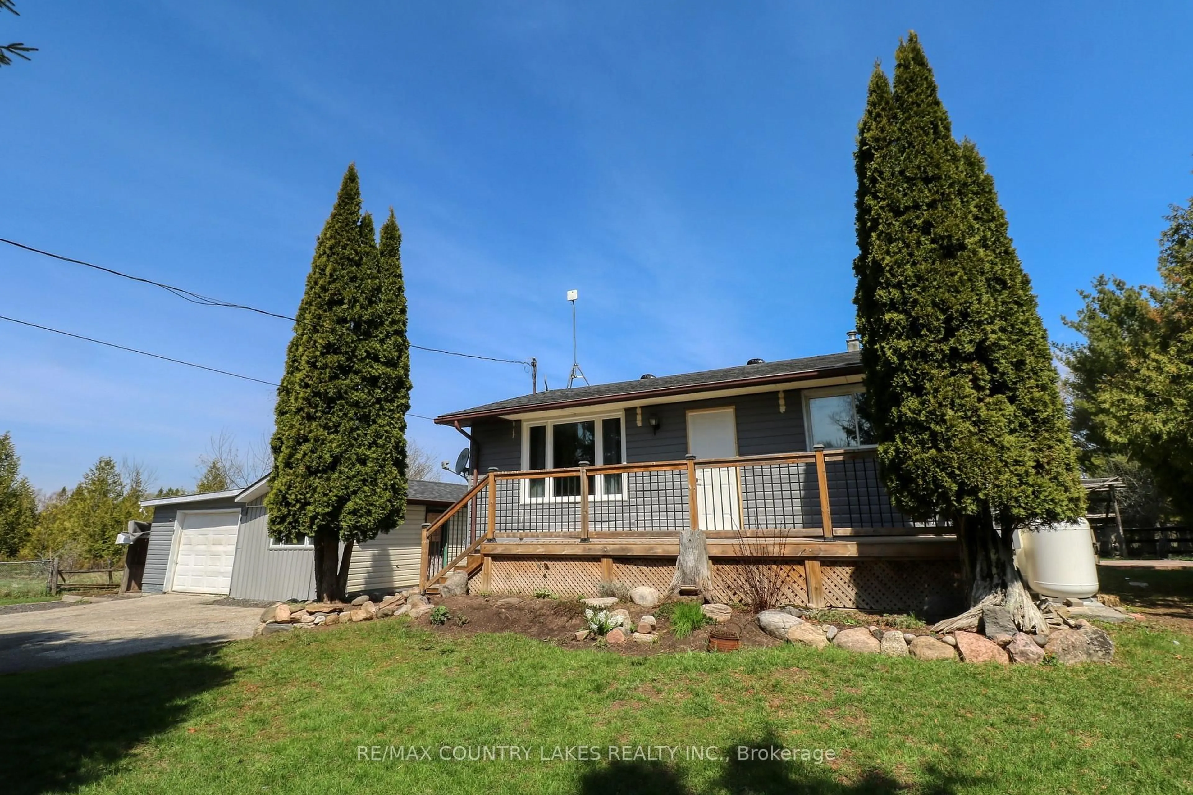 A pic from outside/outdoor area/front of a property/back of a property/a pic from drone, street for 126 Mcguire Beach Rd, Kawartha Lakes Ontario K0M 2B0