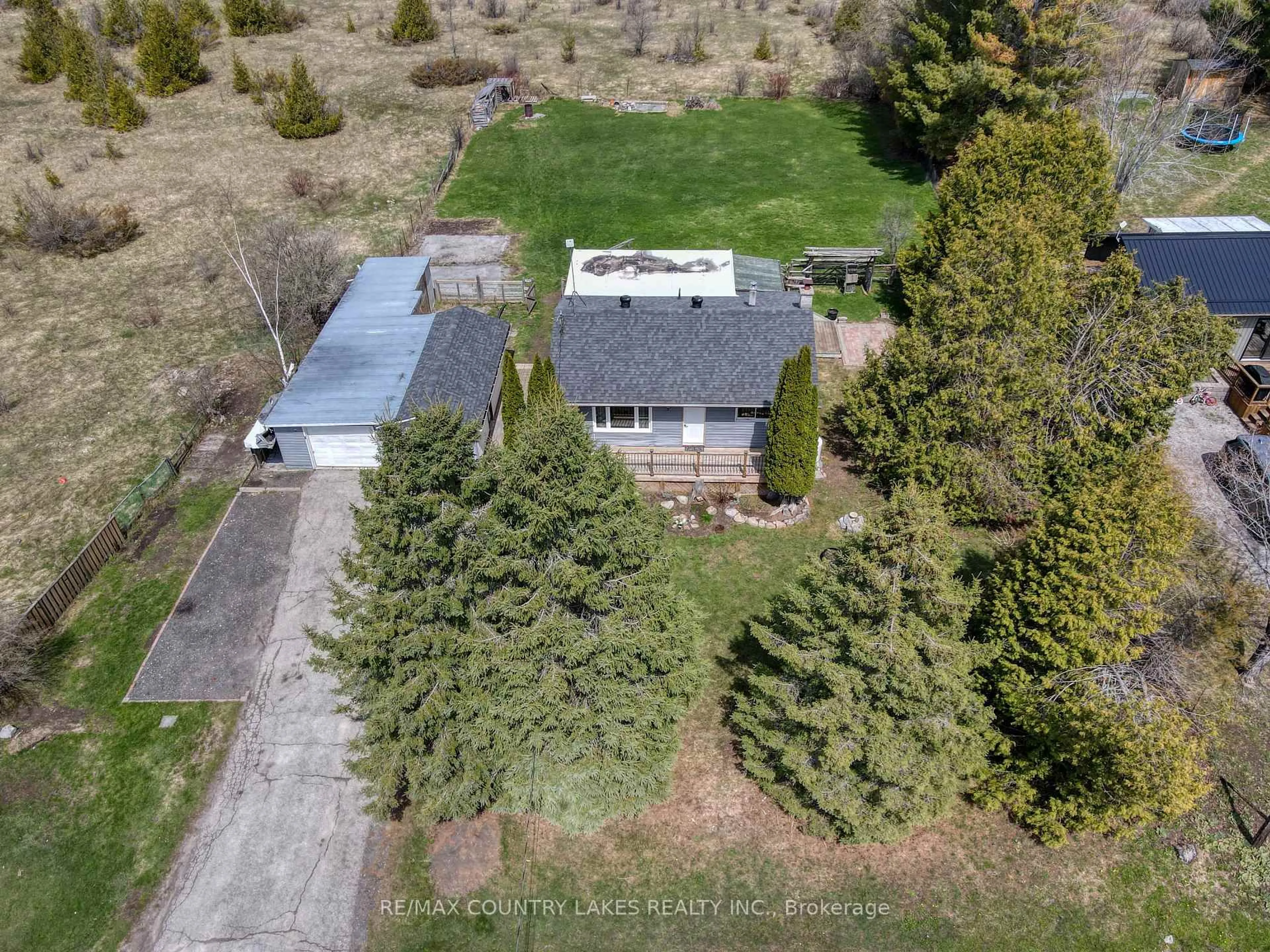 A pic from outside/outdoor area/front of a property/back of a property/a pic from drone, street for 126 Mcguire Beach Rd, Kawartha Lakes Ontario K0M 2B0