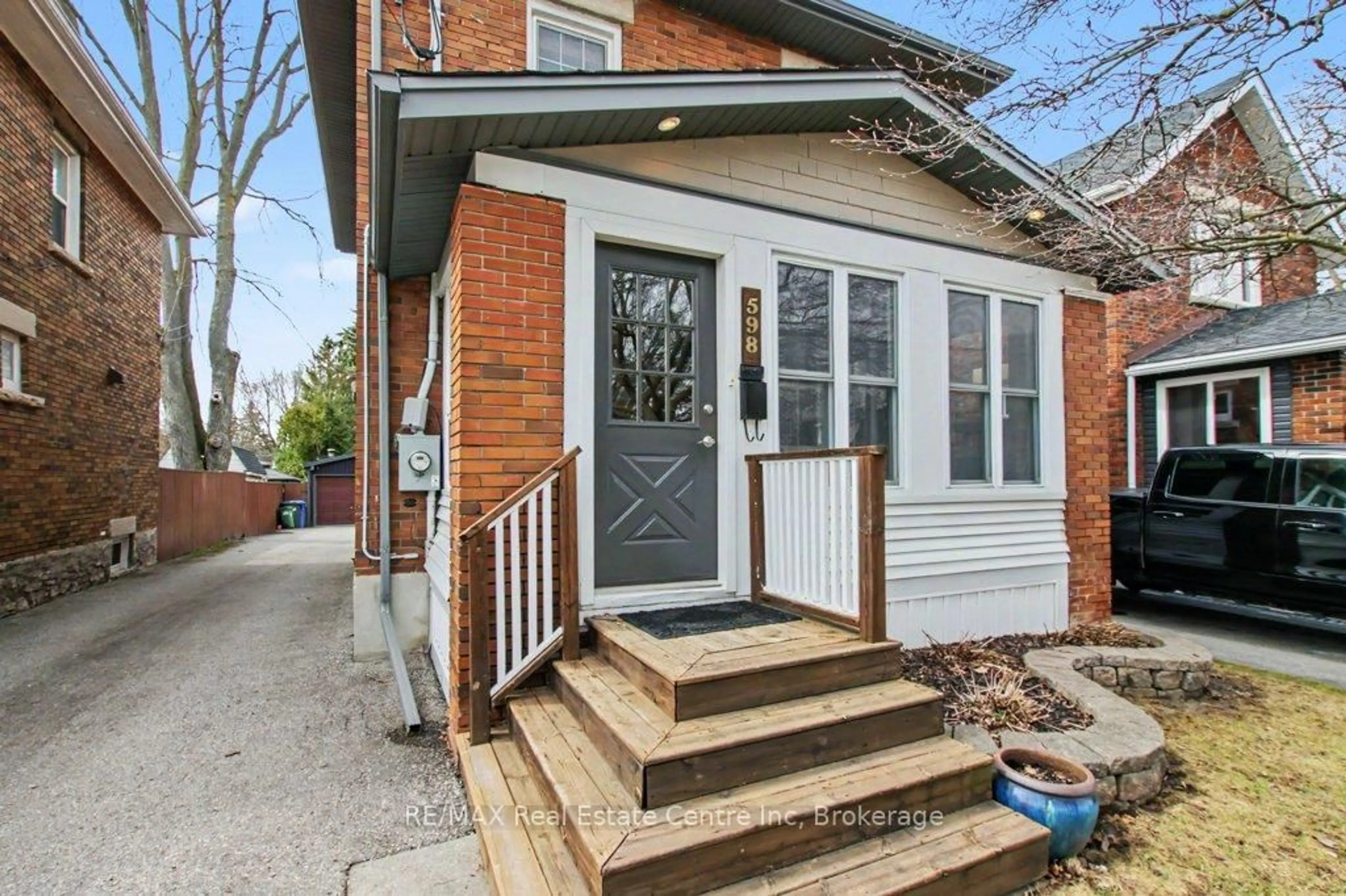 Home with brick exterior material, street for 598 Woolwich St, Guelph Ontario N1H 3Y2