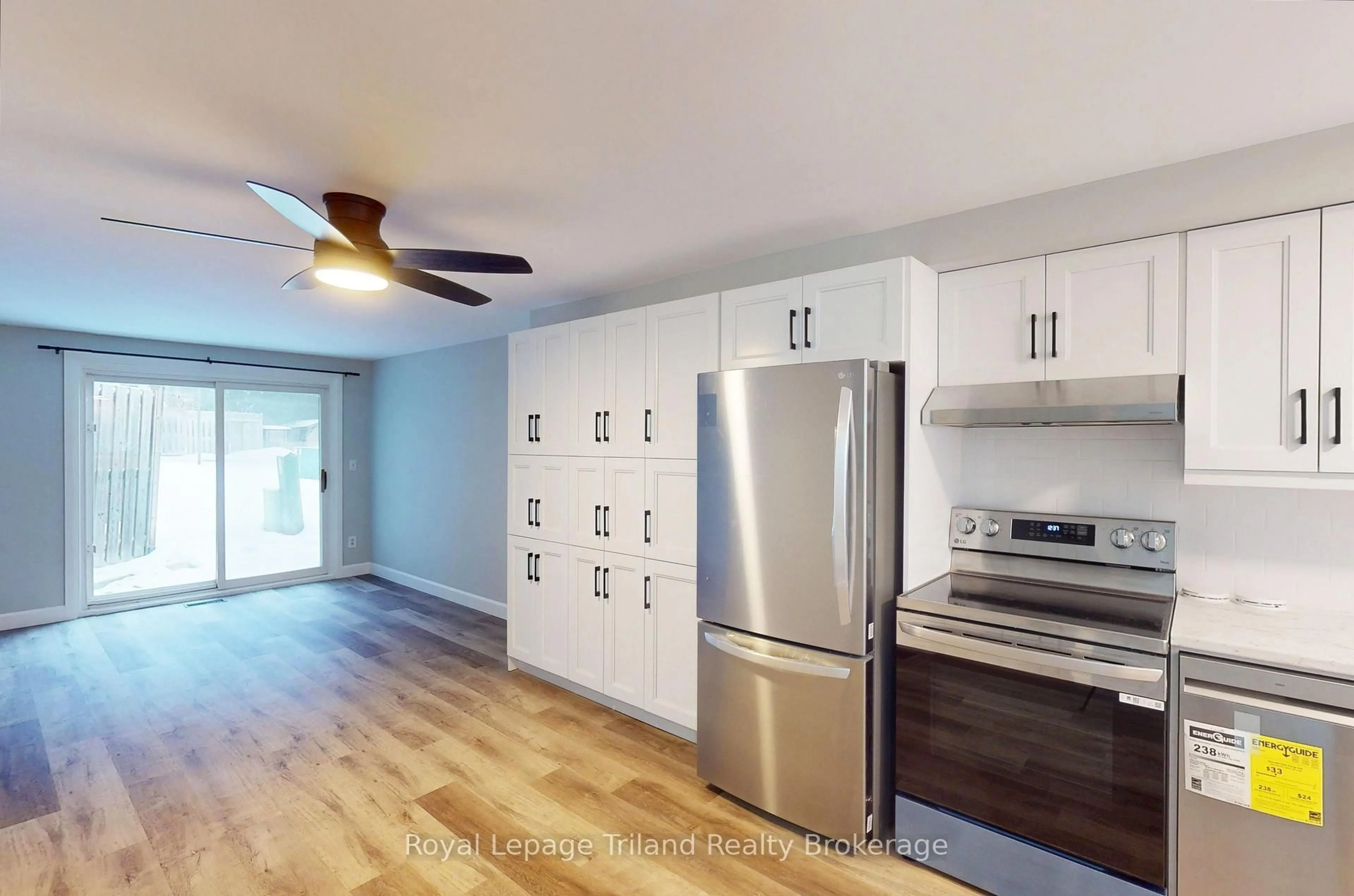 Open concept kitchen, wood/laminate floor for 653 Northdale Dr, Woodstock Ontario N4S 5J8