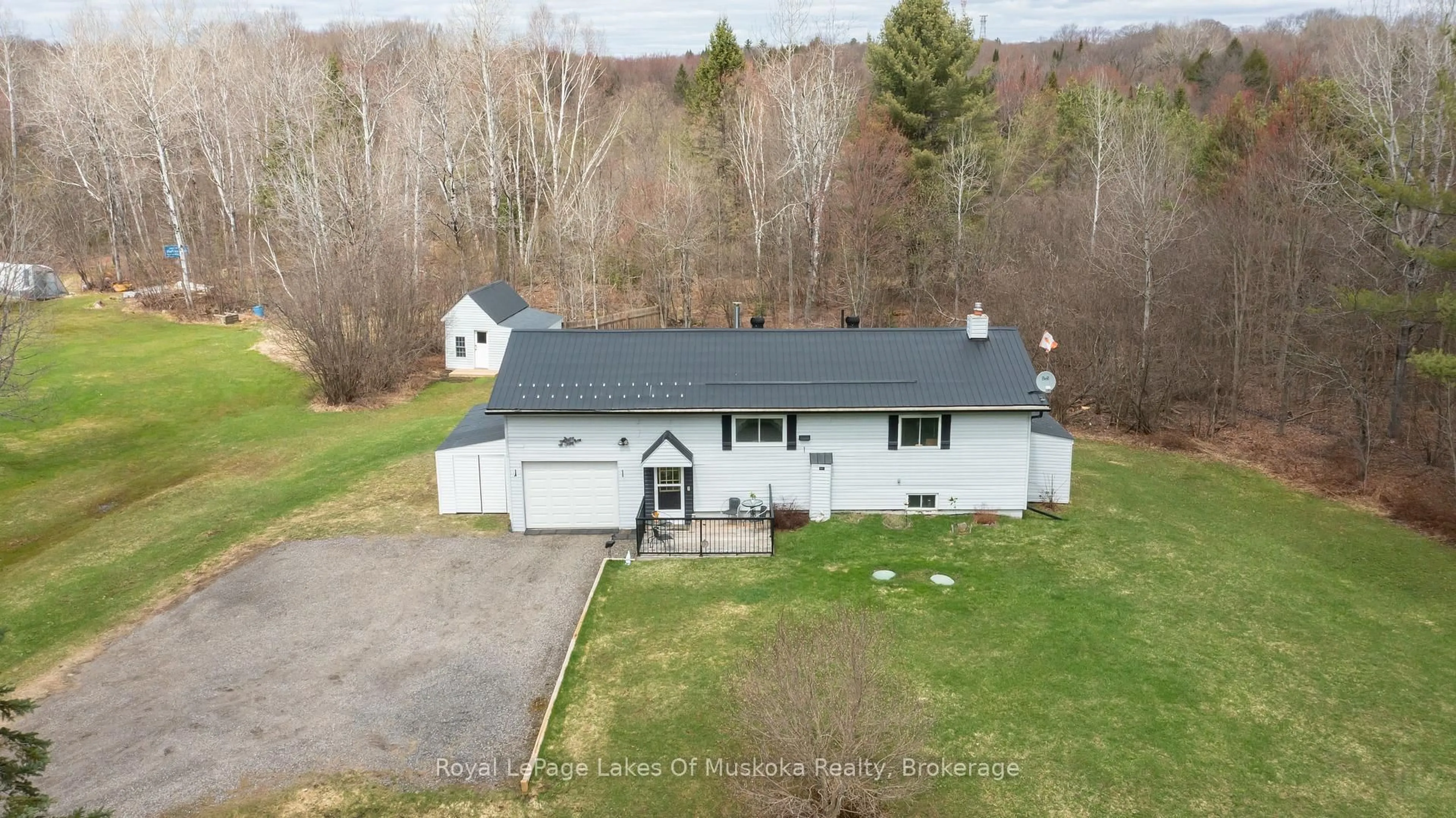 A pic from outside/outdoor area/front of a property/back of a property/a pic from drone, unknown for 1040 Windermere Rd, Muskoka Lakes Ontario P0B 1M0