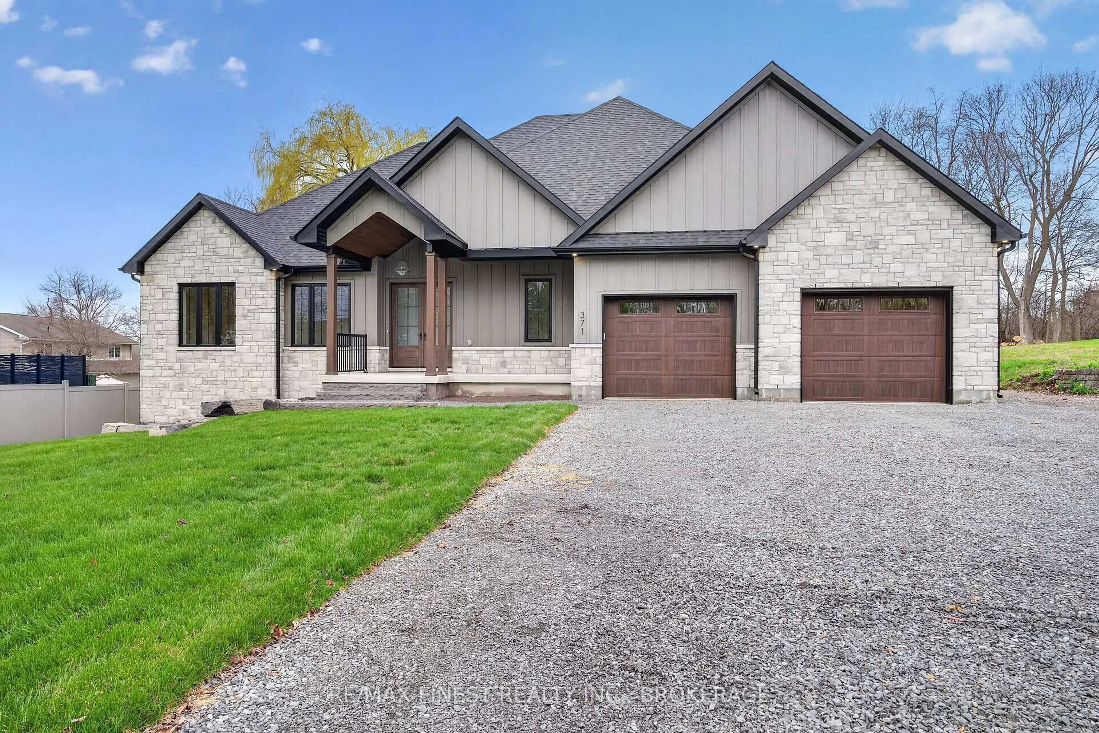 Home with brick exterior material, street for 371 Maple Ridge Dr, Kingston Ontario K7M 5P1