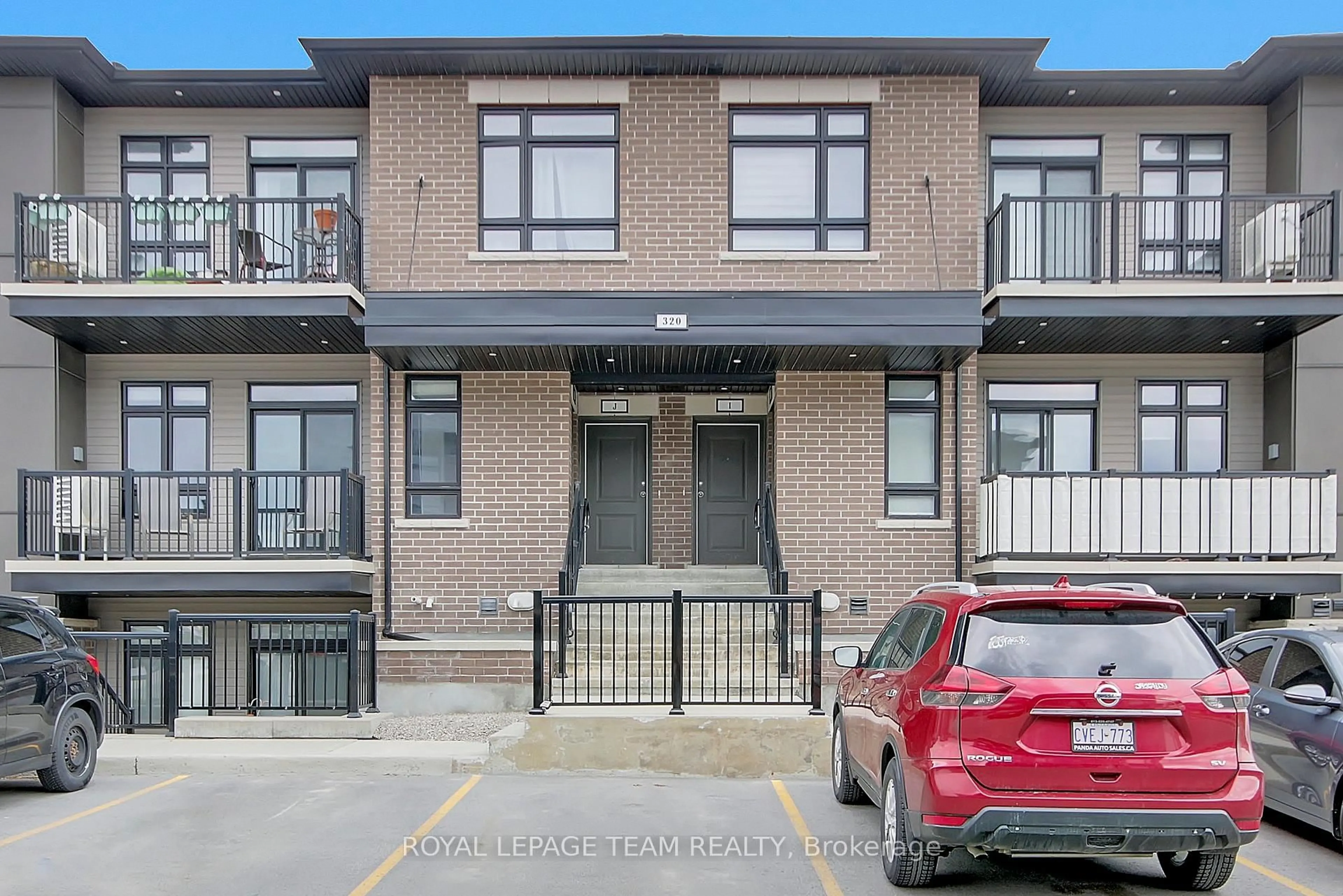 Home with brick exterior material, street for 320 Tulum Cres #F, Ottawa Ontario K2S 0W1