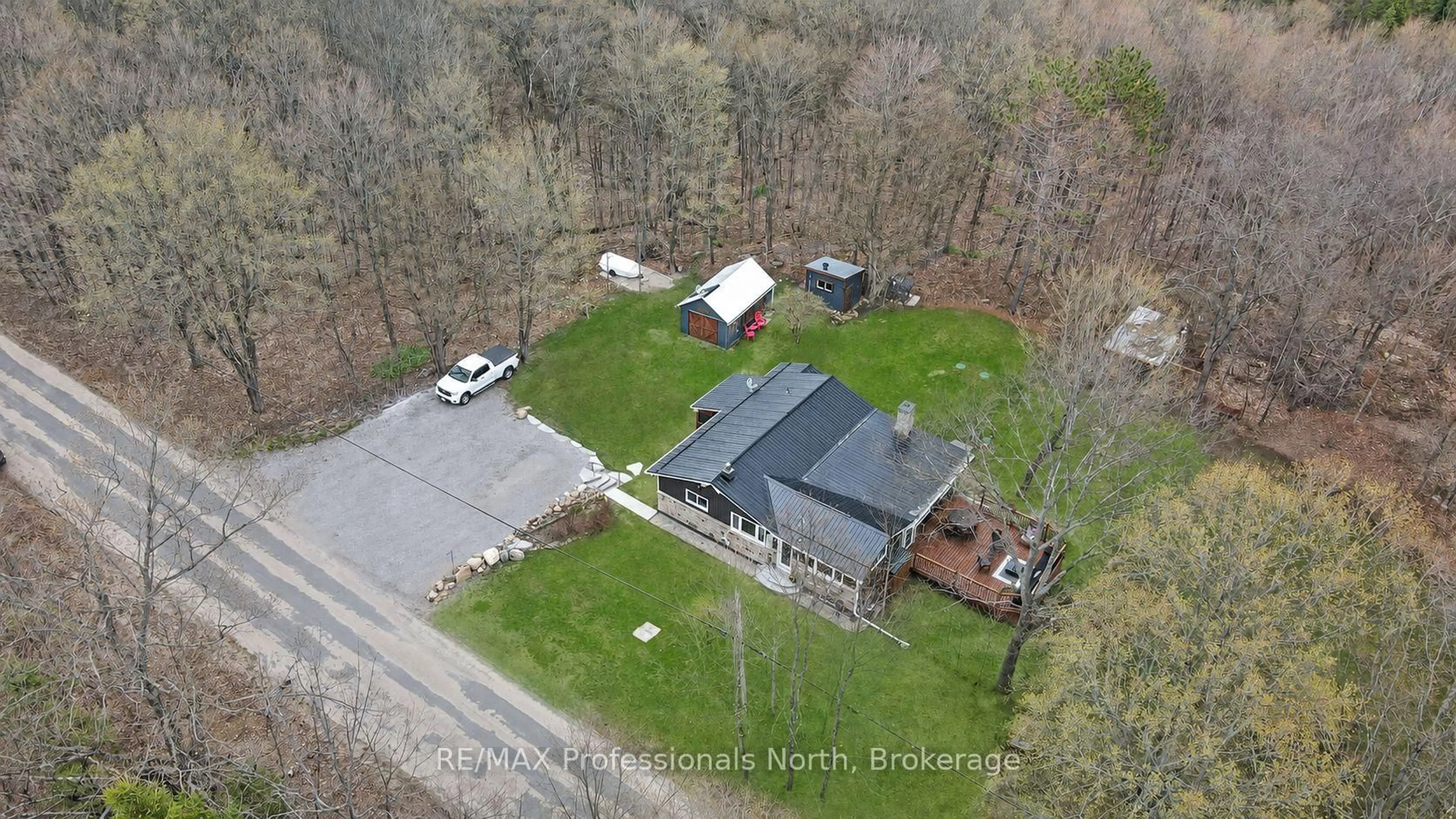 A pic from outside/outdoor area/front of a property/back of a property/a pic from drone, unknown for 1392 Old Donald Rd, Dysart et al Ontario K0M 1S0