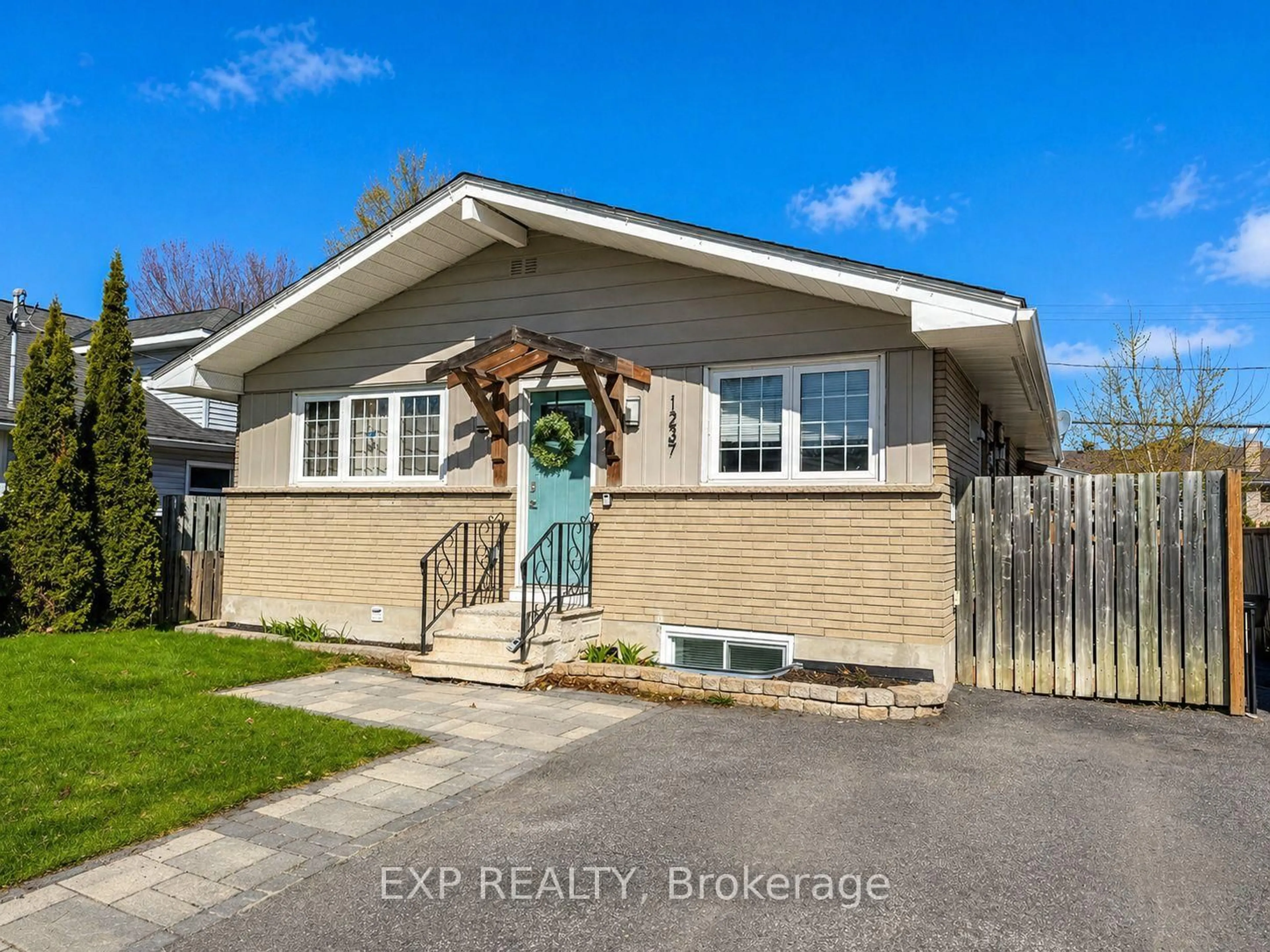 Home with vinyl exterior material, street for 1237 Vancouver Ave, Ottawa Ontario K1V 6V2