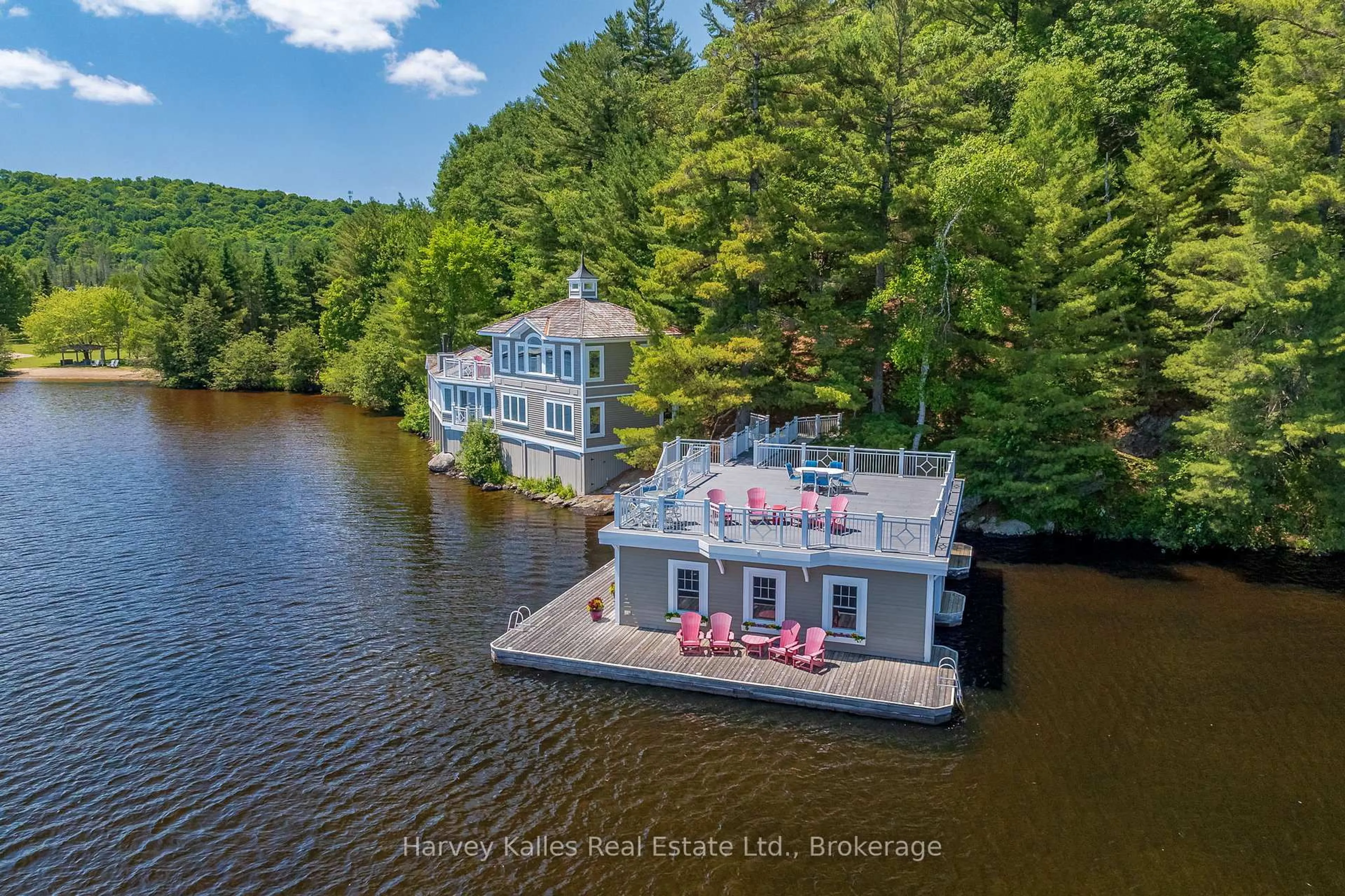 A pic from outside/outdoor area/front of a property/back of a property/a pic from drone, water/lake/river/ocean view for 3661 South Portage Rd, Huntsville Ontario P1H 2J3
