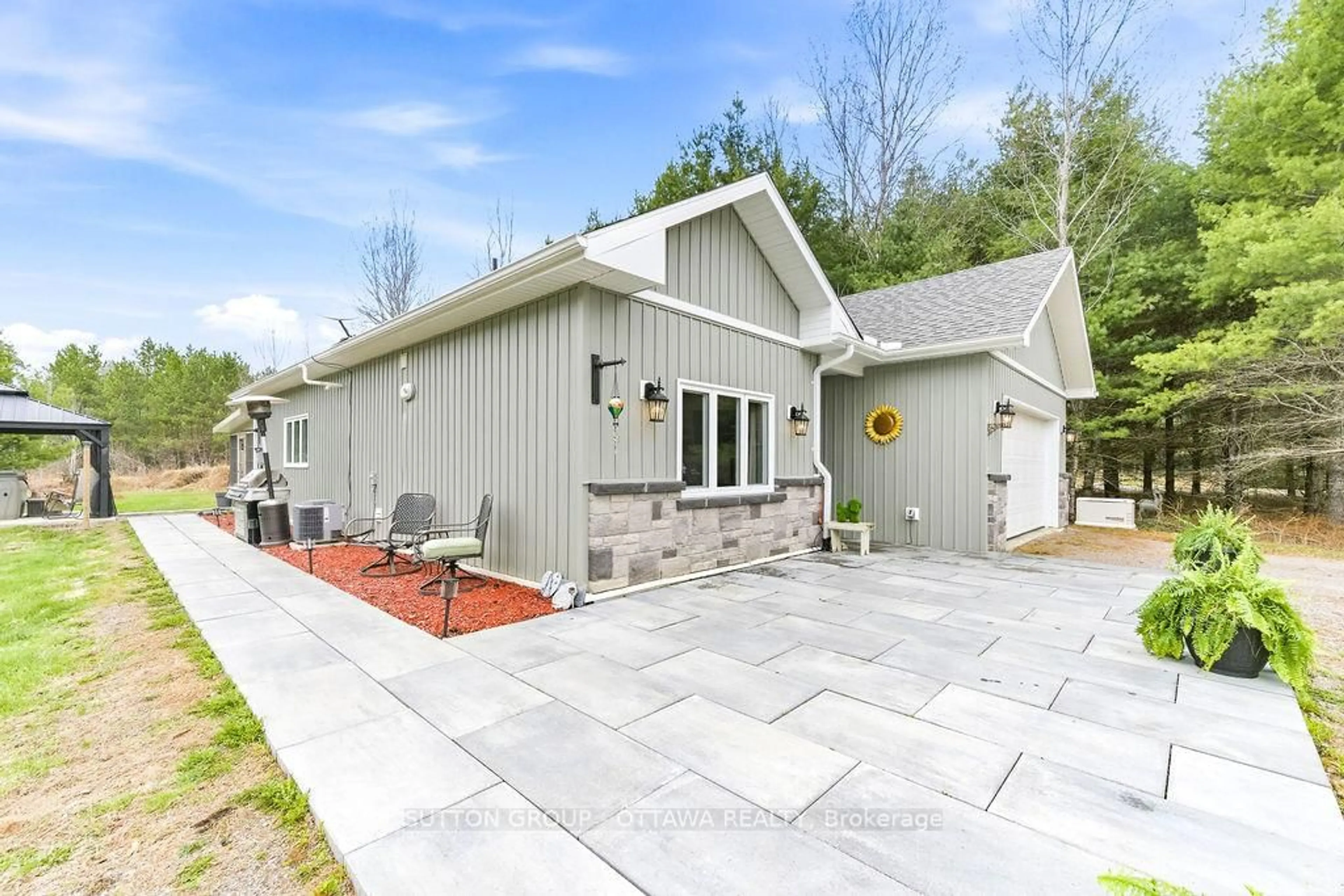 Home with vinyl exterior material, street for 12 Eastern Ave, Griffith Ontario K0J 2R0