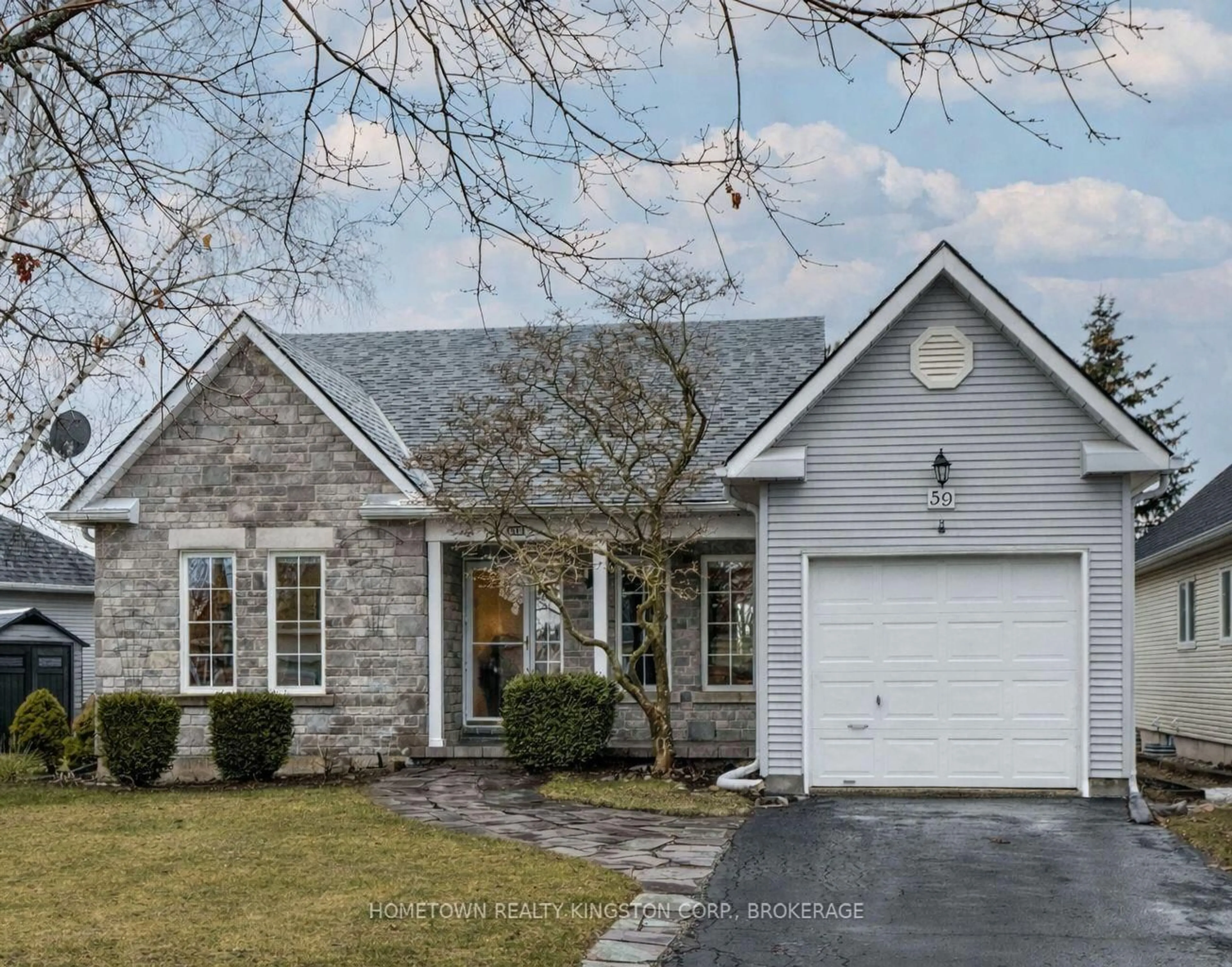 Home with brick exterior material, street for 59 Abbey Dawn Dr, Bath Ontario K0H 1G0