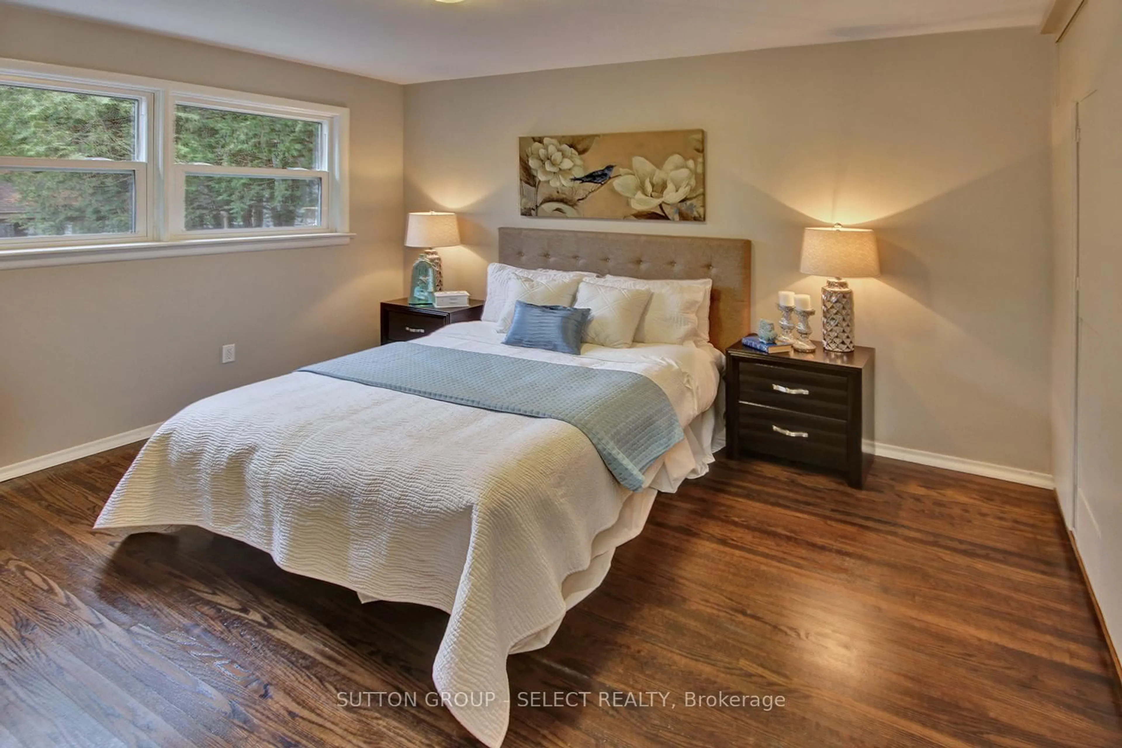Bedroom with bed, wood/laminate floor for 196 Emery St, London South Ontario N6C 2E2