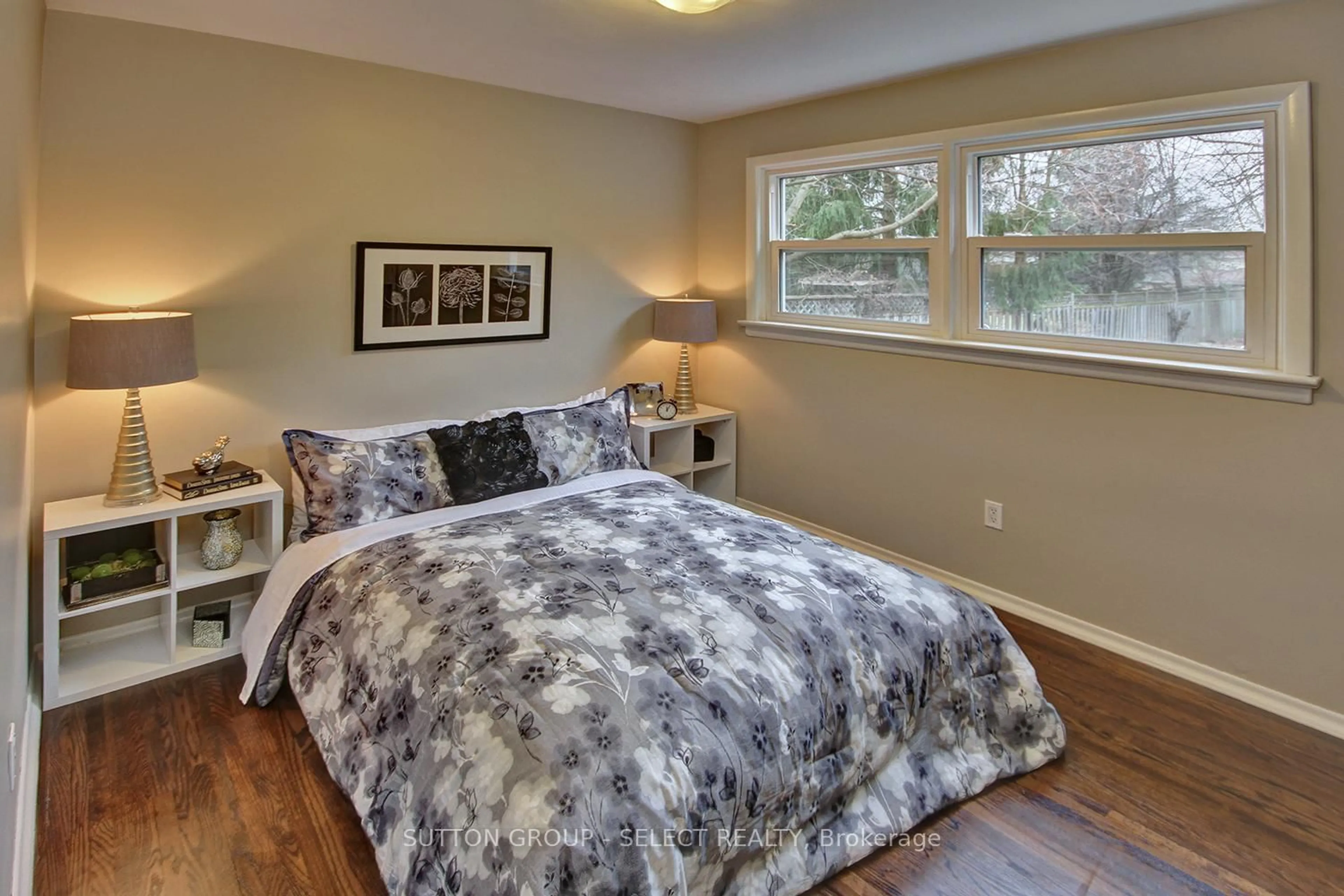 Bedroom with bed, wood/laminate floor for 196 Emery St, London South Ontario N6C 2E2