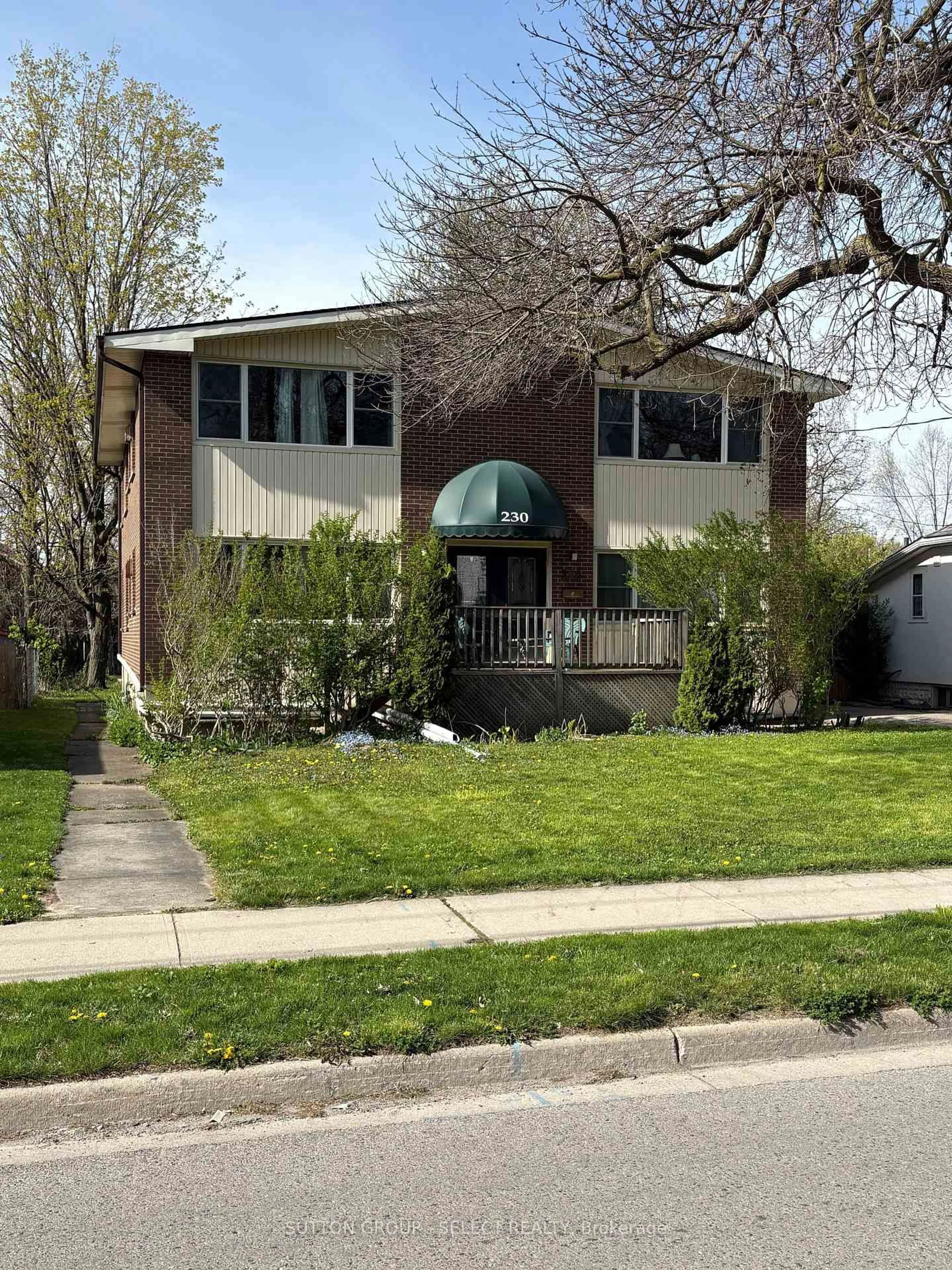Home with vinyl exterior material, street for 230 Emery St, London South Ontario N6C 2E2
