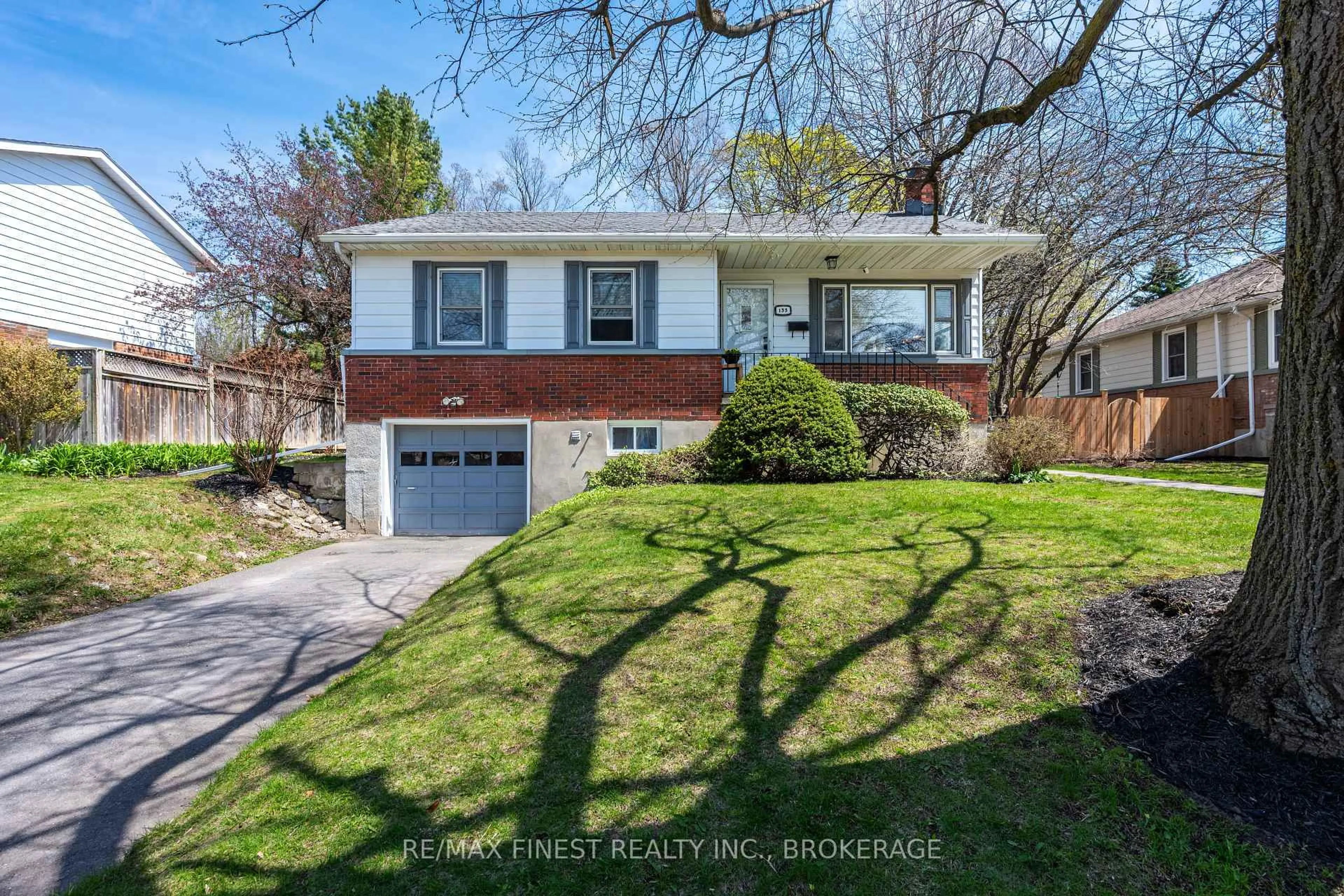 Home with vinyl exterior material, street for 133 Indian Rd, Kingston Ontario K7M 1T1