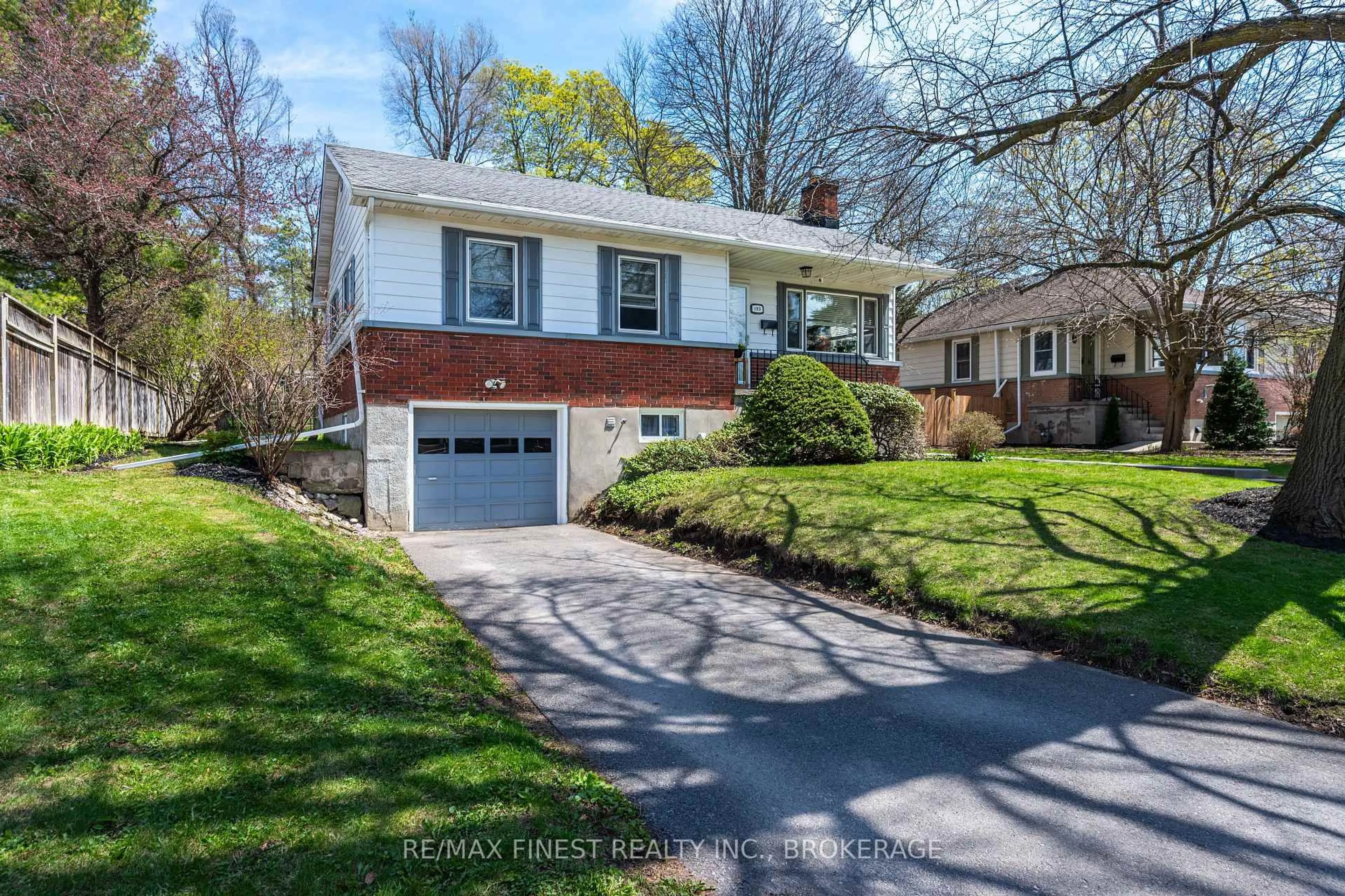 Home with vinyl exterior material, street for 133 Indian Rd, Kingston Ontario K7M 1T1