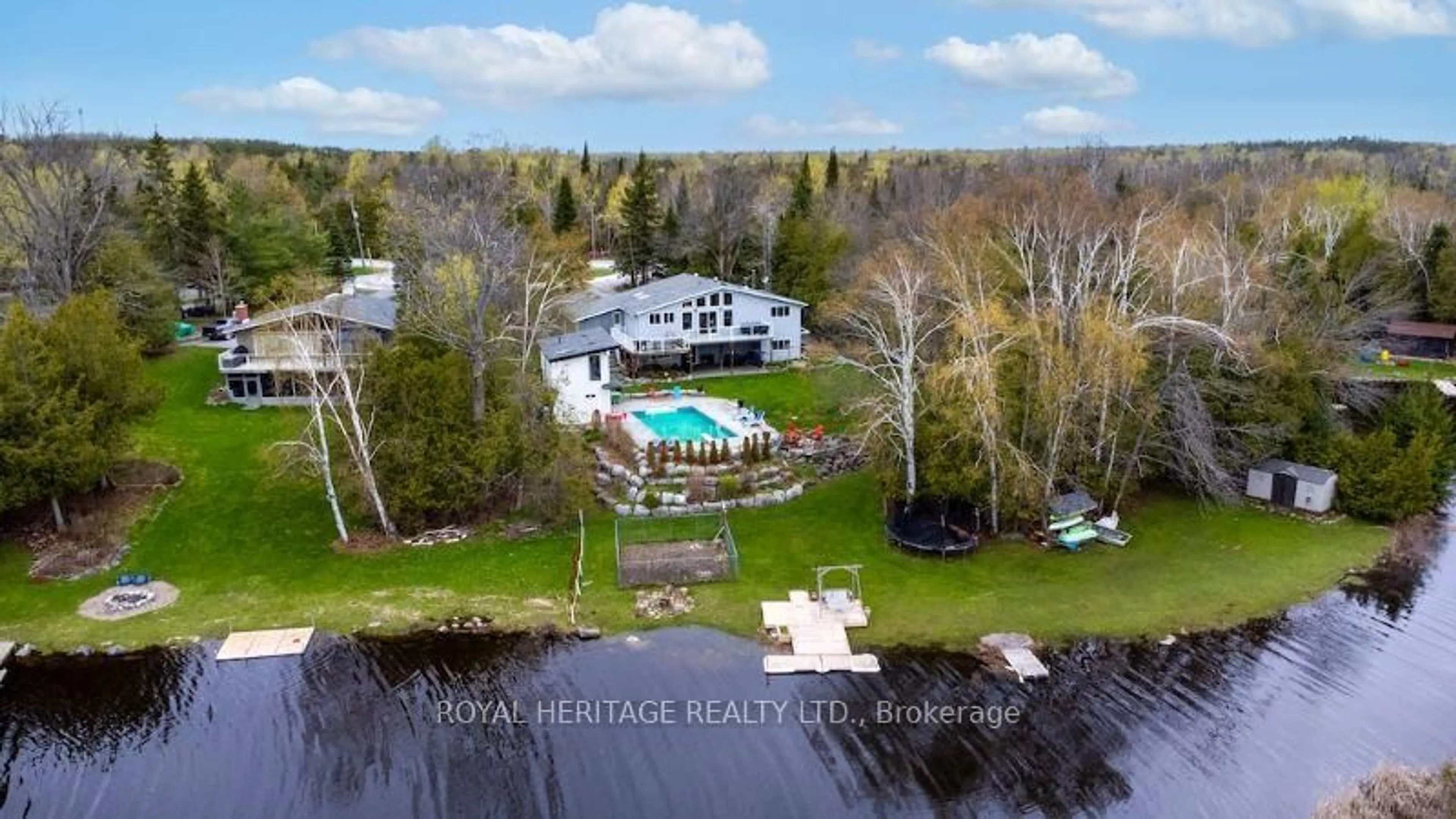 A pic from outside/outdoor area/front of a property/back of a property/a pic from drone, water/lake/river/ocean view for 202 Sumcot Dr, Trent Lakes Ontario K0L 1J0
