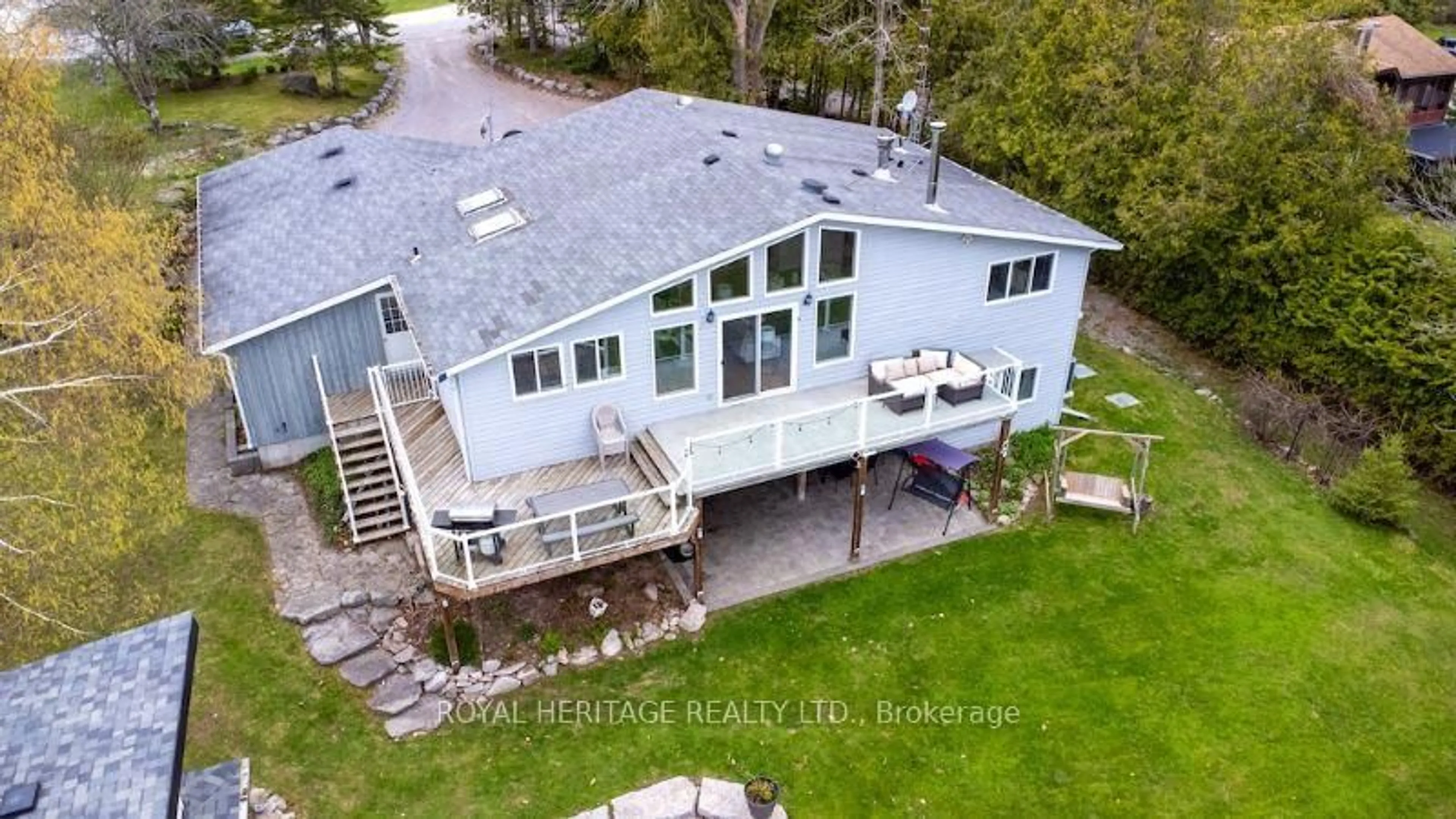 A pic from outside/outdoor area/front of a property/back of a property/a pic from drone, water/lake/river/ocean view for 202 Sumcot Dr, Trent Lakes Ontario K0L 1J0