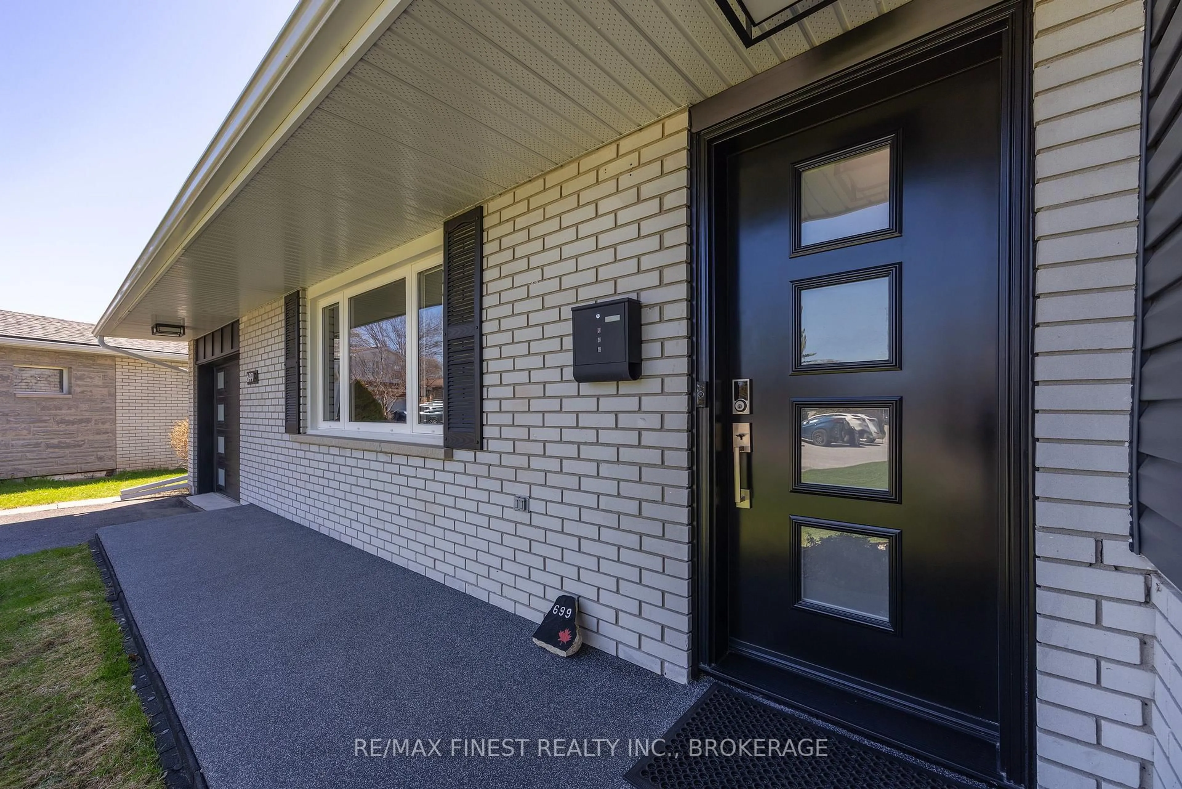 Home with brick exterior material, street for 699 Wembly Pl, Kingston Ontario K7M 5L7