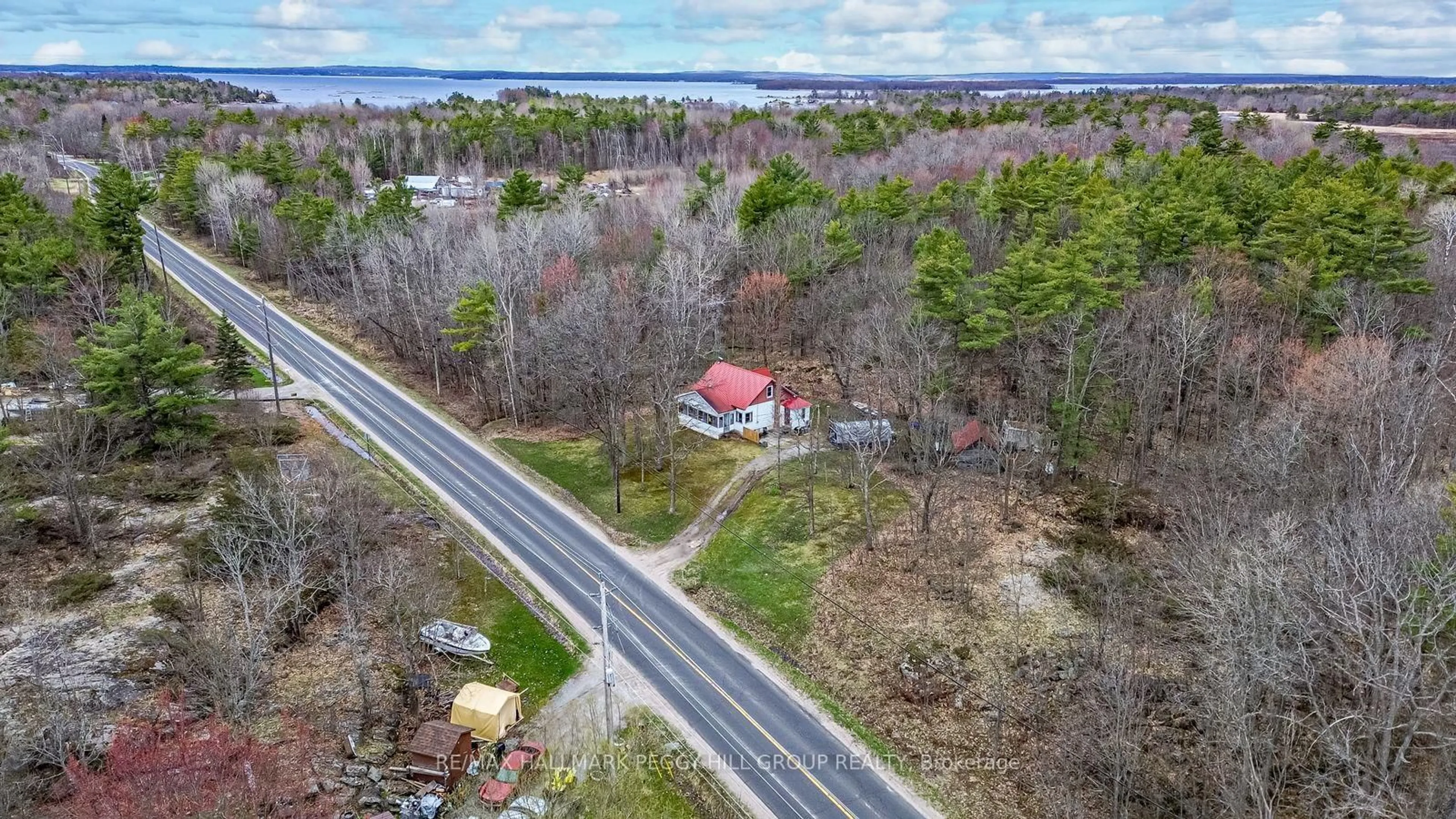 A pic from outside/outdoor area/front of a property/back of a property/a pic from drone, unknown for 1301 Honey Harbour Rd, Georgian Bay Ontario L0K 1S0