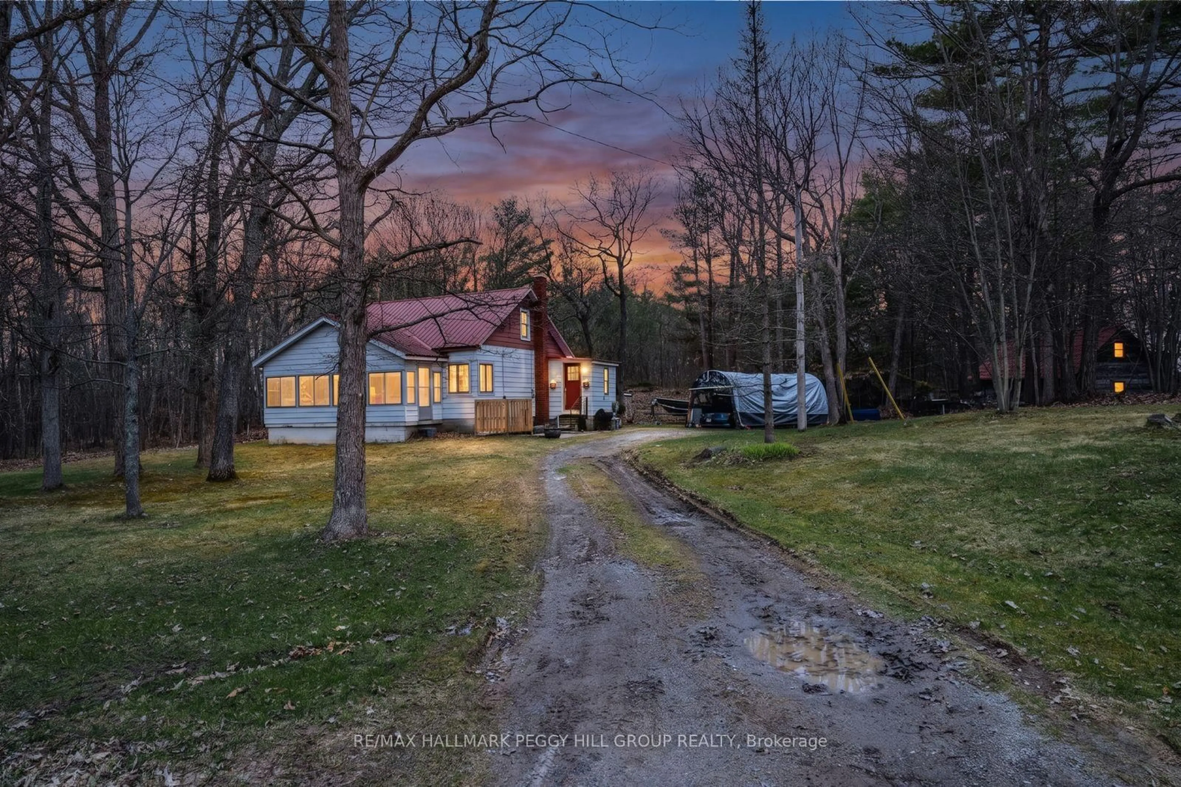A pic from outside/outdoor area/front of a property/back of a property/a pic from drone, street for 1301 Honey Harbour Rd, Georgian Bay Ontario L0K 1S0
