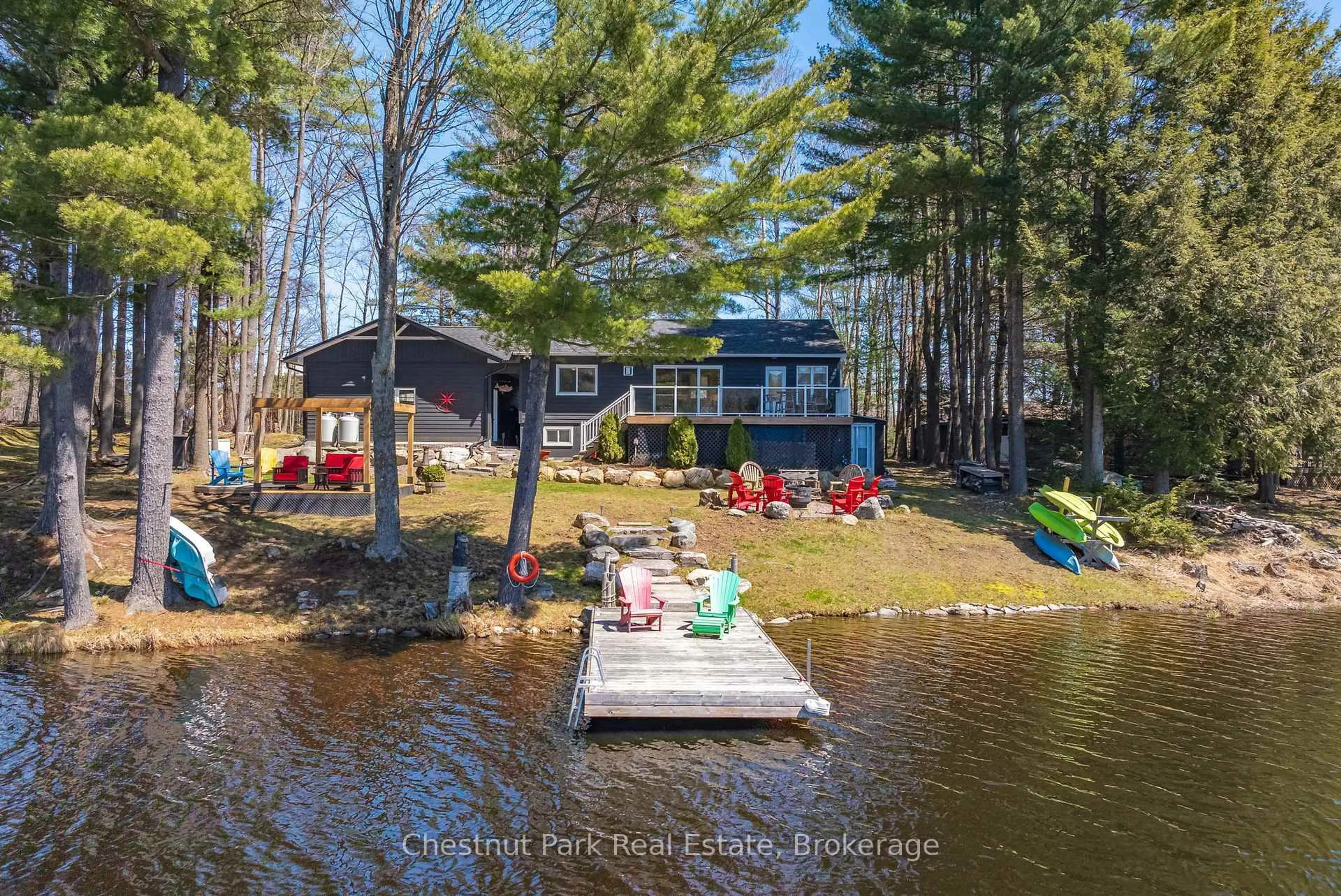 A pic from outside/outdoor area/front of a property/back of a property/a pic from drone, water/lake/river/ocean view for 1006 Young's Rd #7, Muskoka Lakes Ontario P0B 1J0