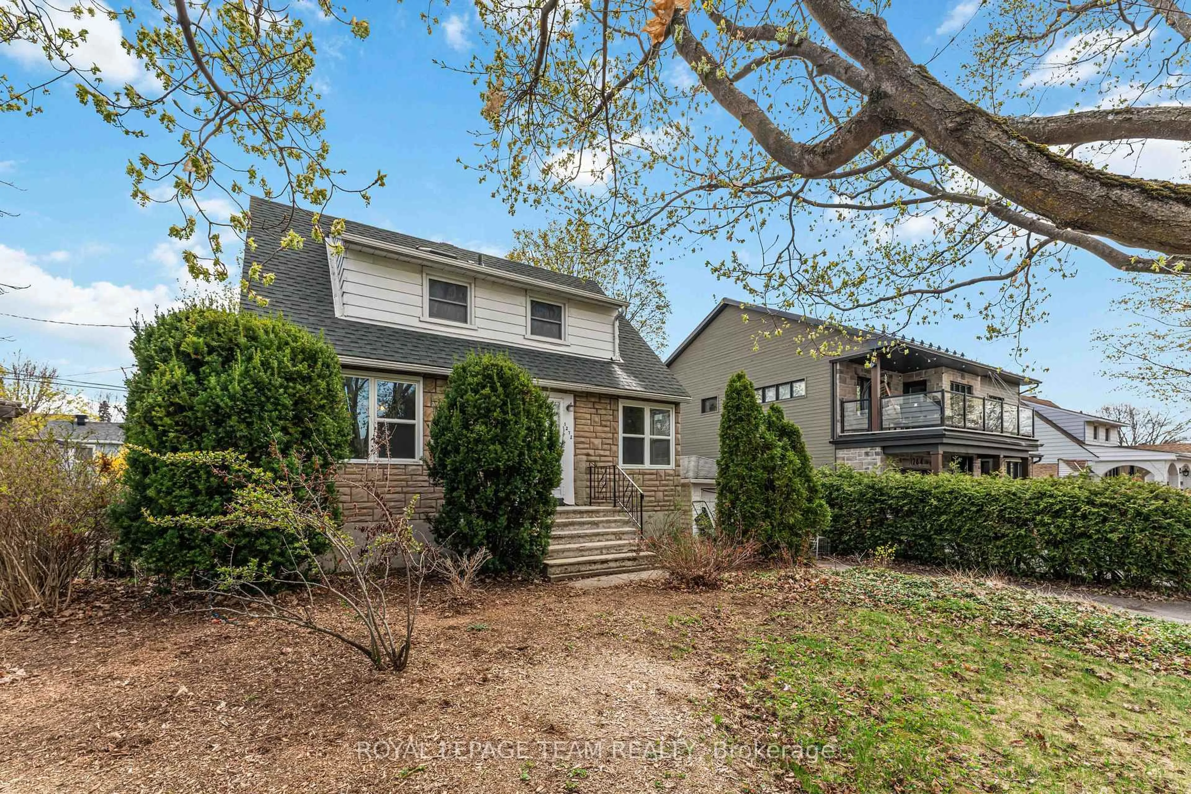 Home with vinyl exterior material, street for 1272 Livingstone Ave, Ottawa Ontario K1H 7P8