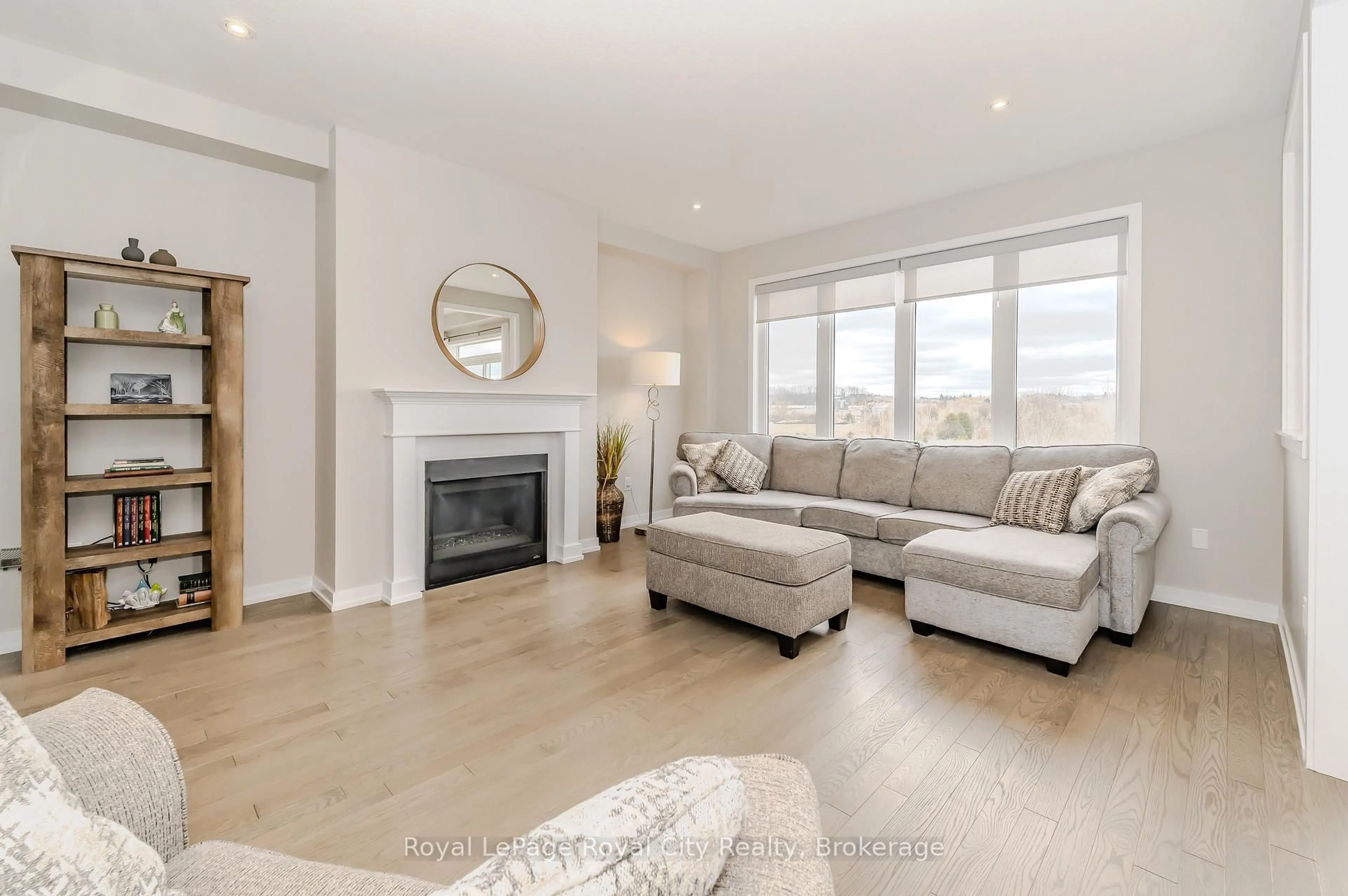 Living room with furniture, wood/laminate floor for 262 Dolman St, Woolwich Ontario N0B 1M0