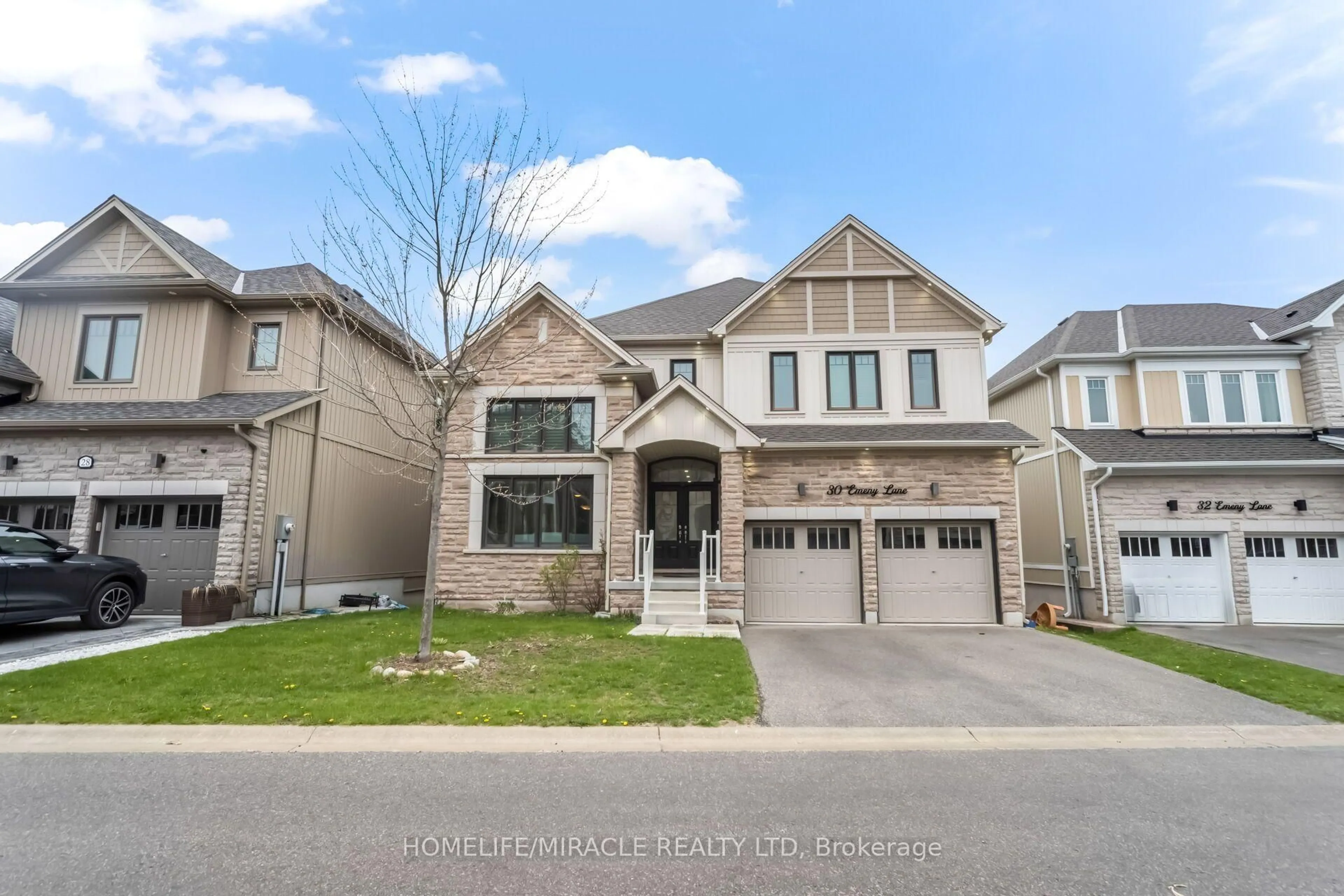 Home with brick exterior material, street for 30 Emeny Lane #11, Guelph Ontario N1L 0H3