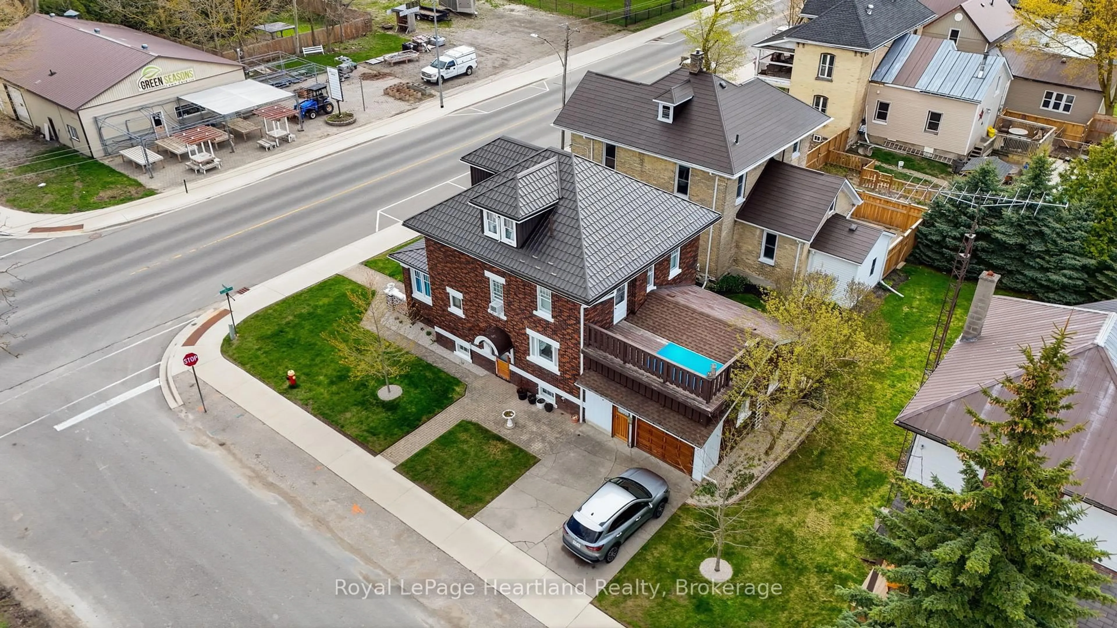 A pic from outside/outdoor area/front of a property/back of a property/a pic from drone, street for 57 Elora St, Minto Ontario N0G 1M0