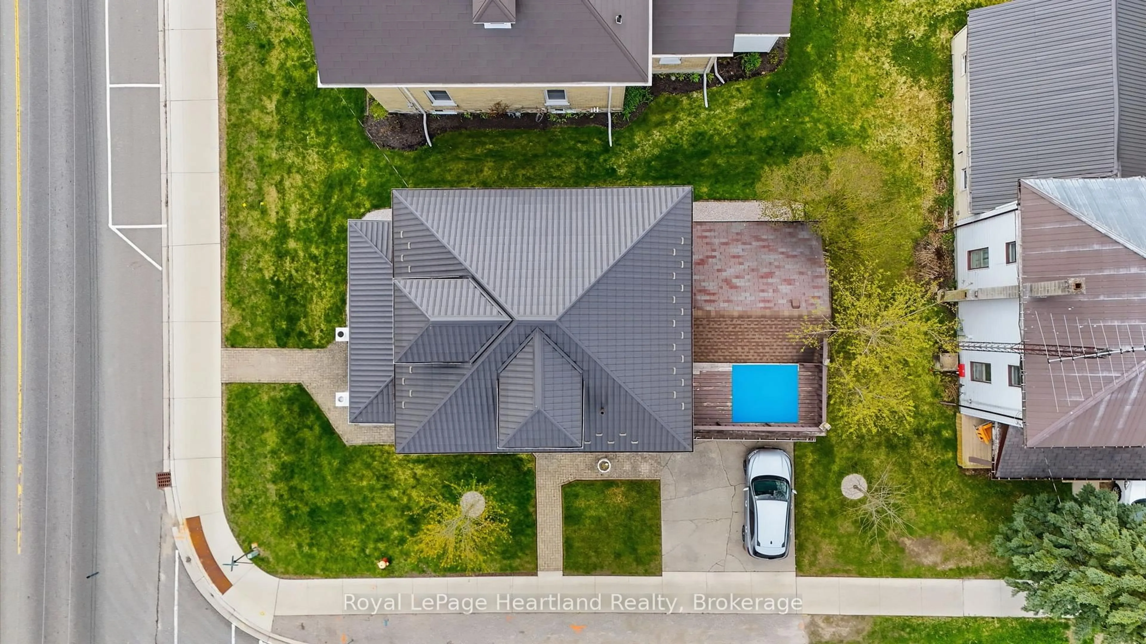 A pic from outside/outdoor area/front of a property/back of a property/a pic from drone, street for 57 Elora St, Minto Ontario N0G 1M0