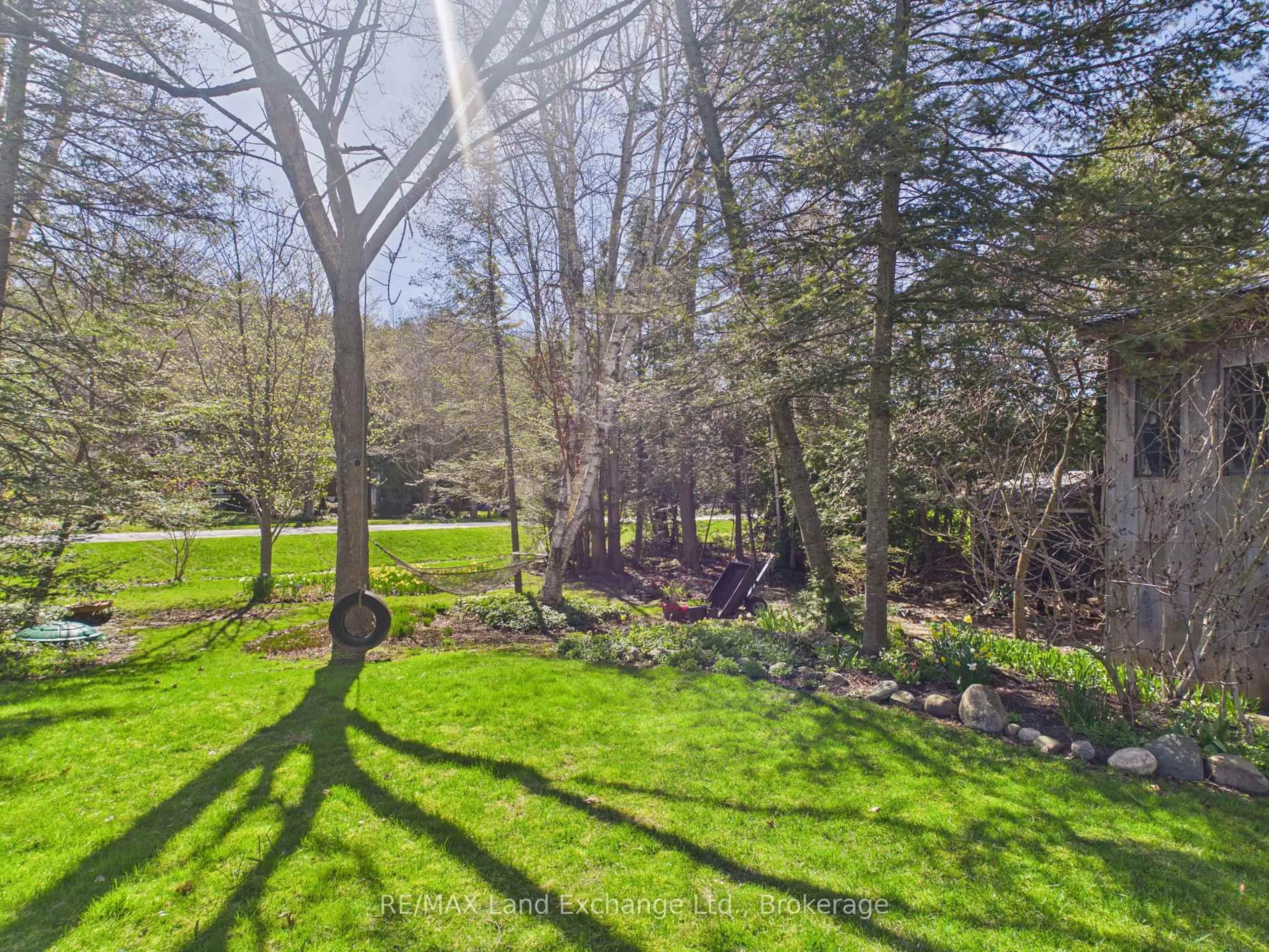 A pic from outside/outdoor area/front of a property/back of a property/a pic from drone, forest/trees view for 15 North Cedar Lane, Kincardine Ontario N0G 2T0