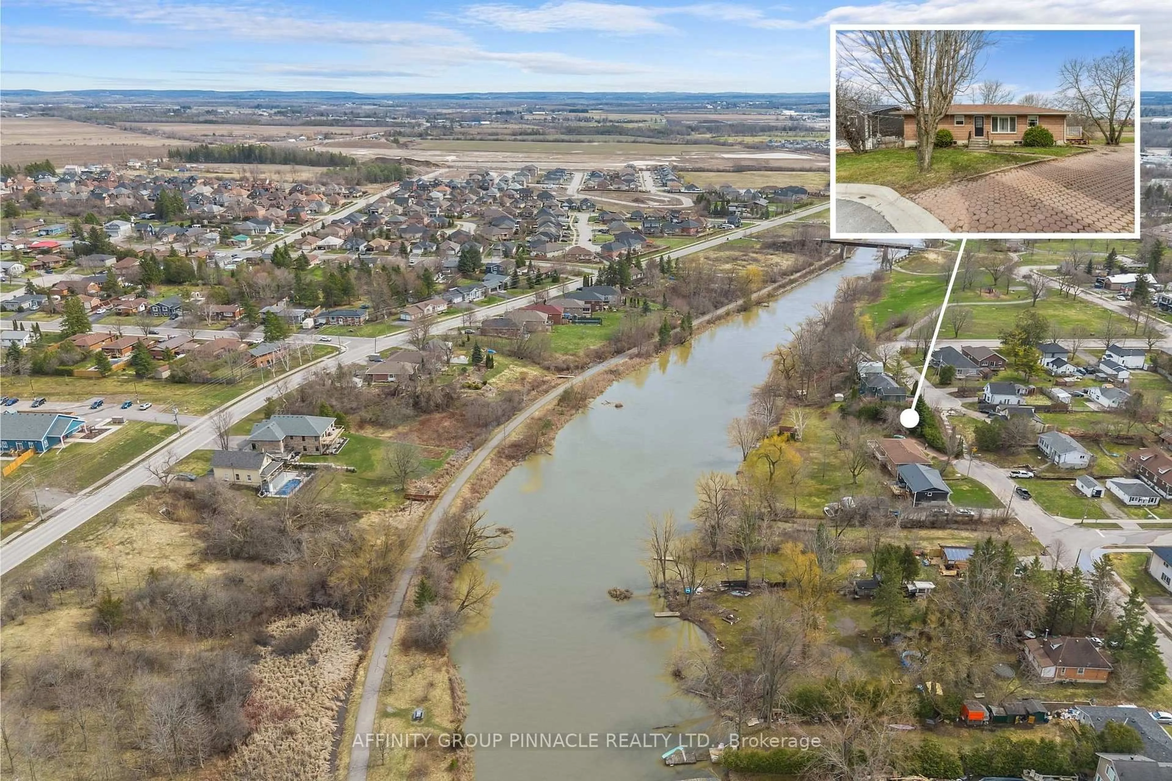 A pic from outside/outdoor area/front of a property/back of a property/a pic from drone, water/lake/river/ocean view for 28 Water St, Kawartha Lakes Ontario K9V 2C8