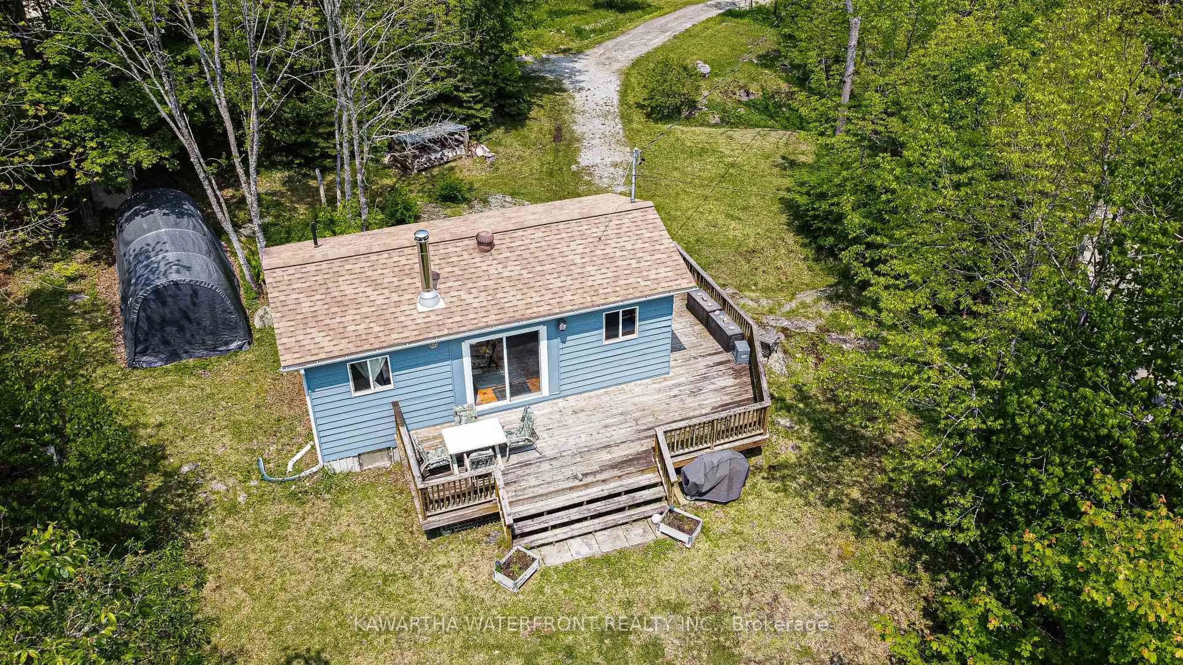 A pic from outside/outdoor area/front of a property/back of a property/a pic from drone, unknown for 1120 English Circ, Highlands East Ontario K0M 1R0