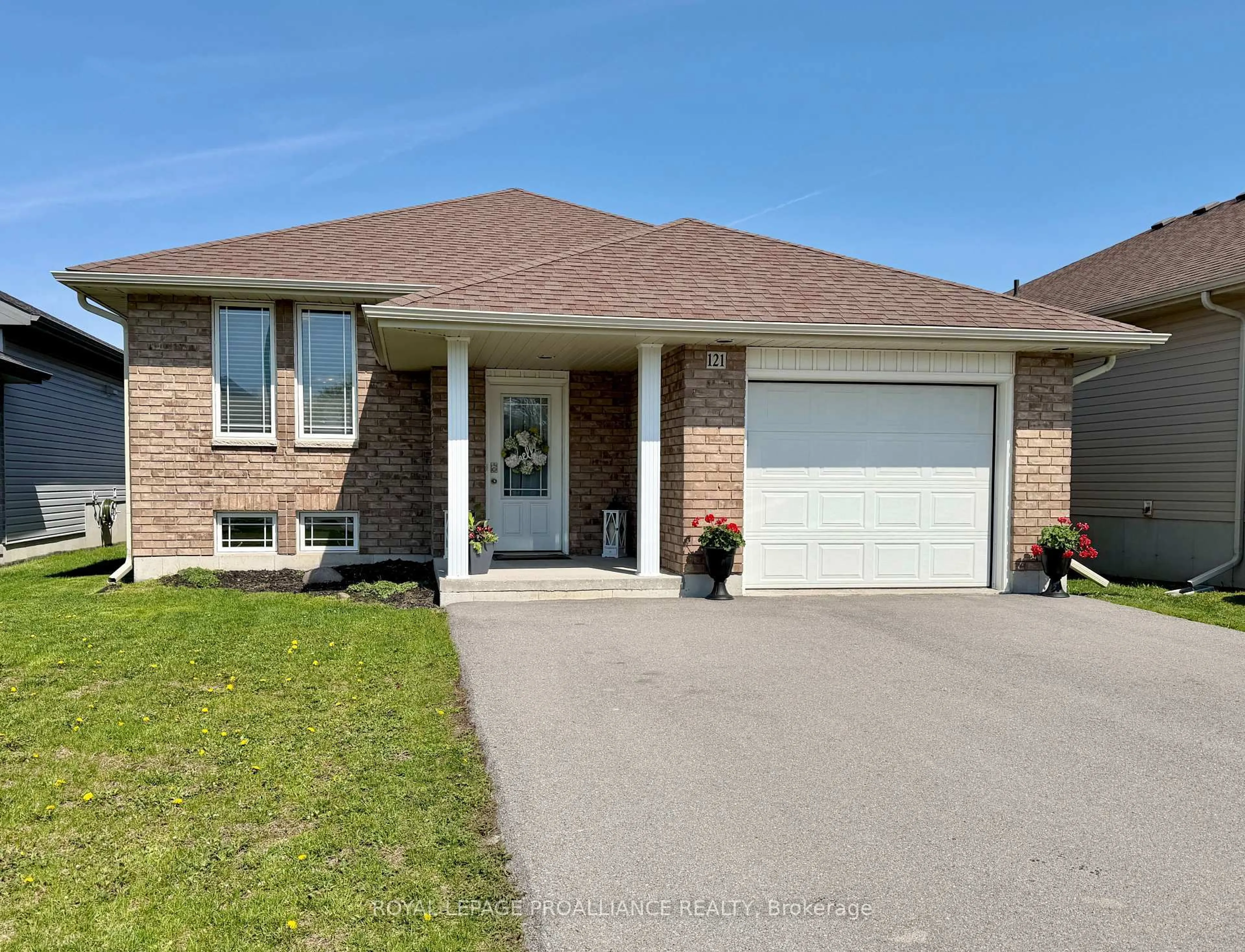 Home with brick exterior material, street for 121 Greenhill Lane, Belleville Ontario K8N 0C7