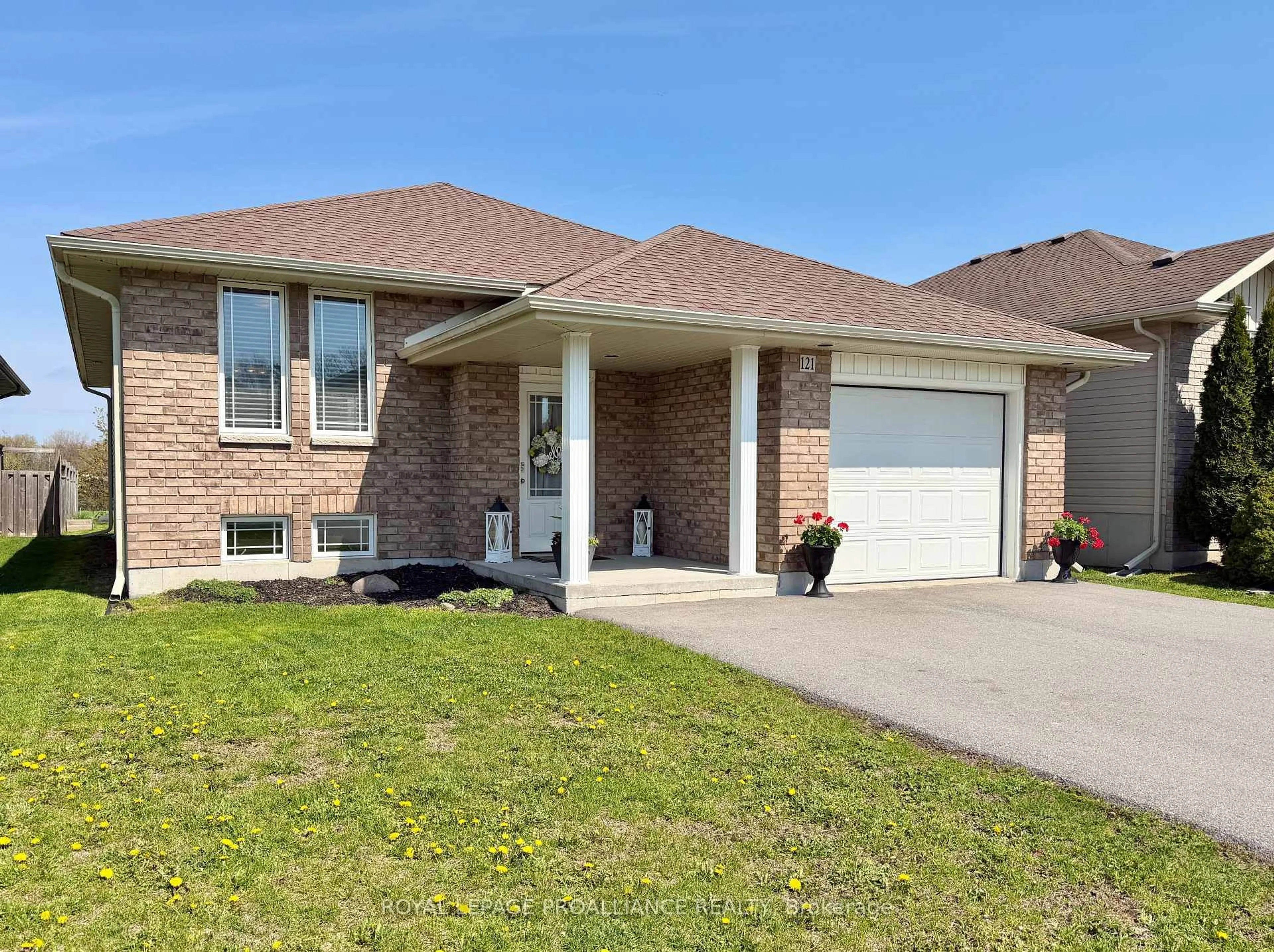 Home with brick exterior material, street for 121 Greenhill Lane, Belleville Ontario K8N 0C7