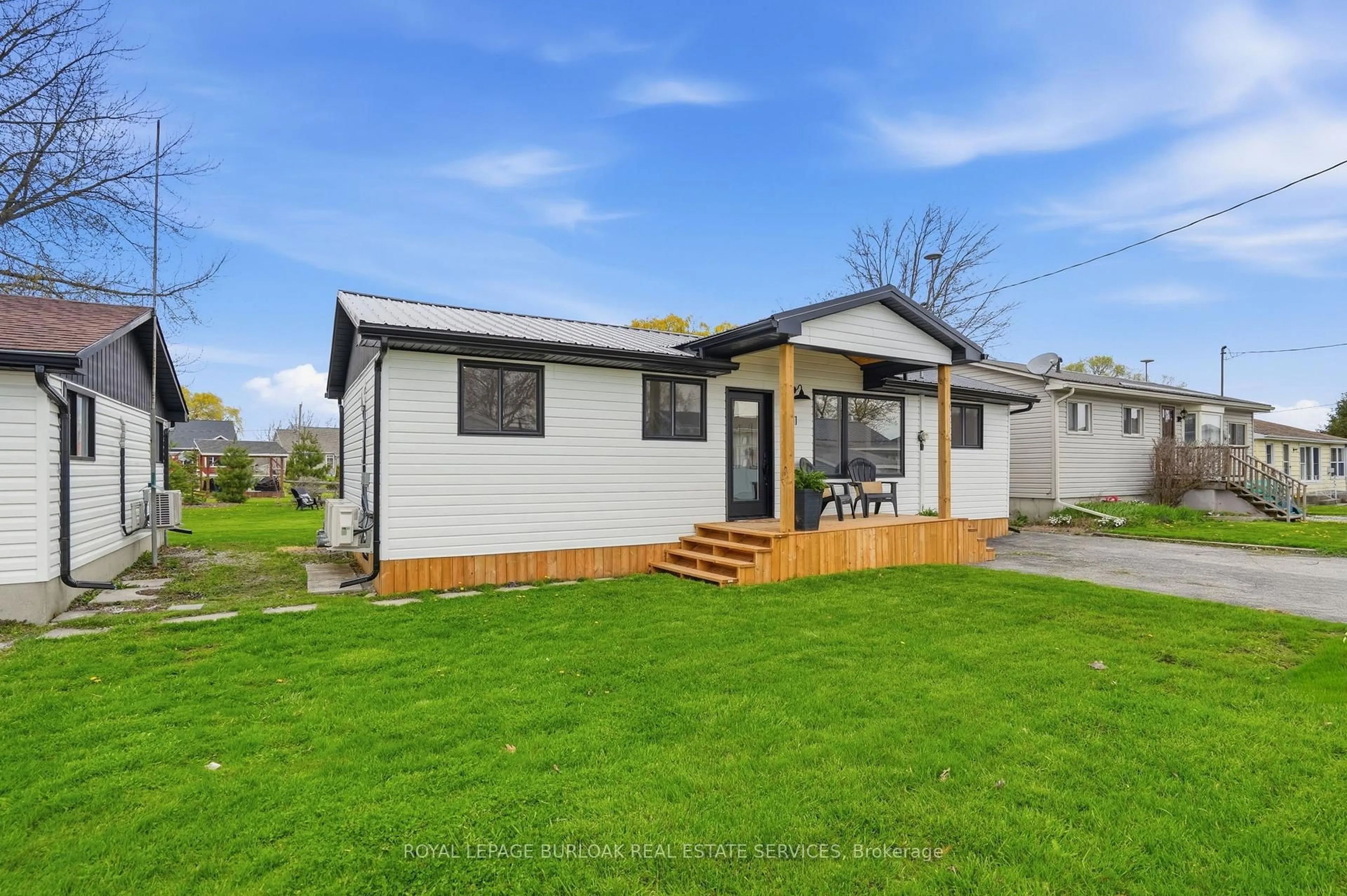 Home with vinyl exterior material, street for 51 Vola Beach Lane, Haldimand Ontario N0A 1P0