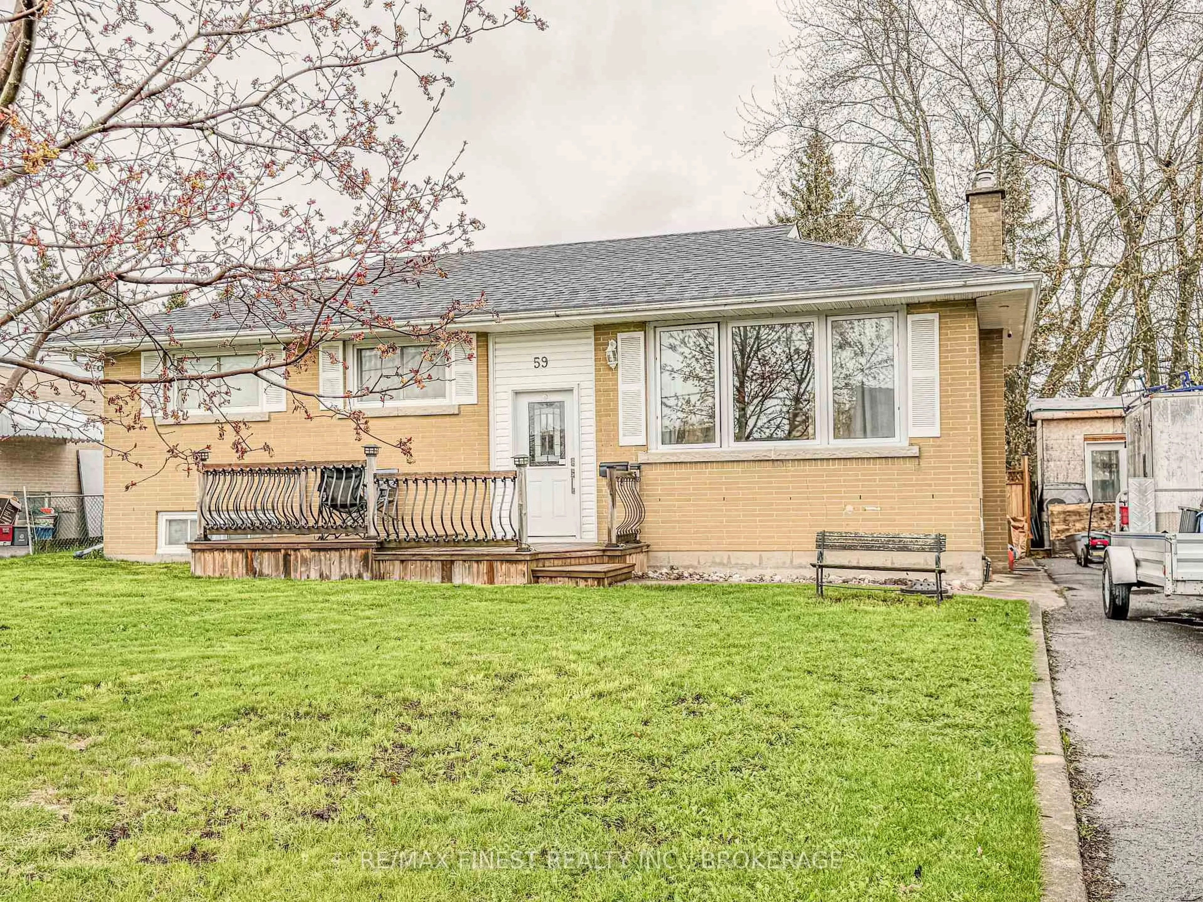 Home with vinyl exterior material, street for 59 Fairfield Blvd, Loyalist Ontario K7N 1L3